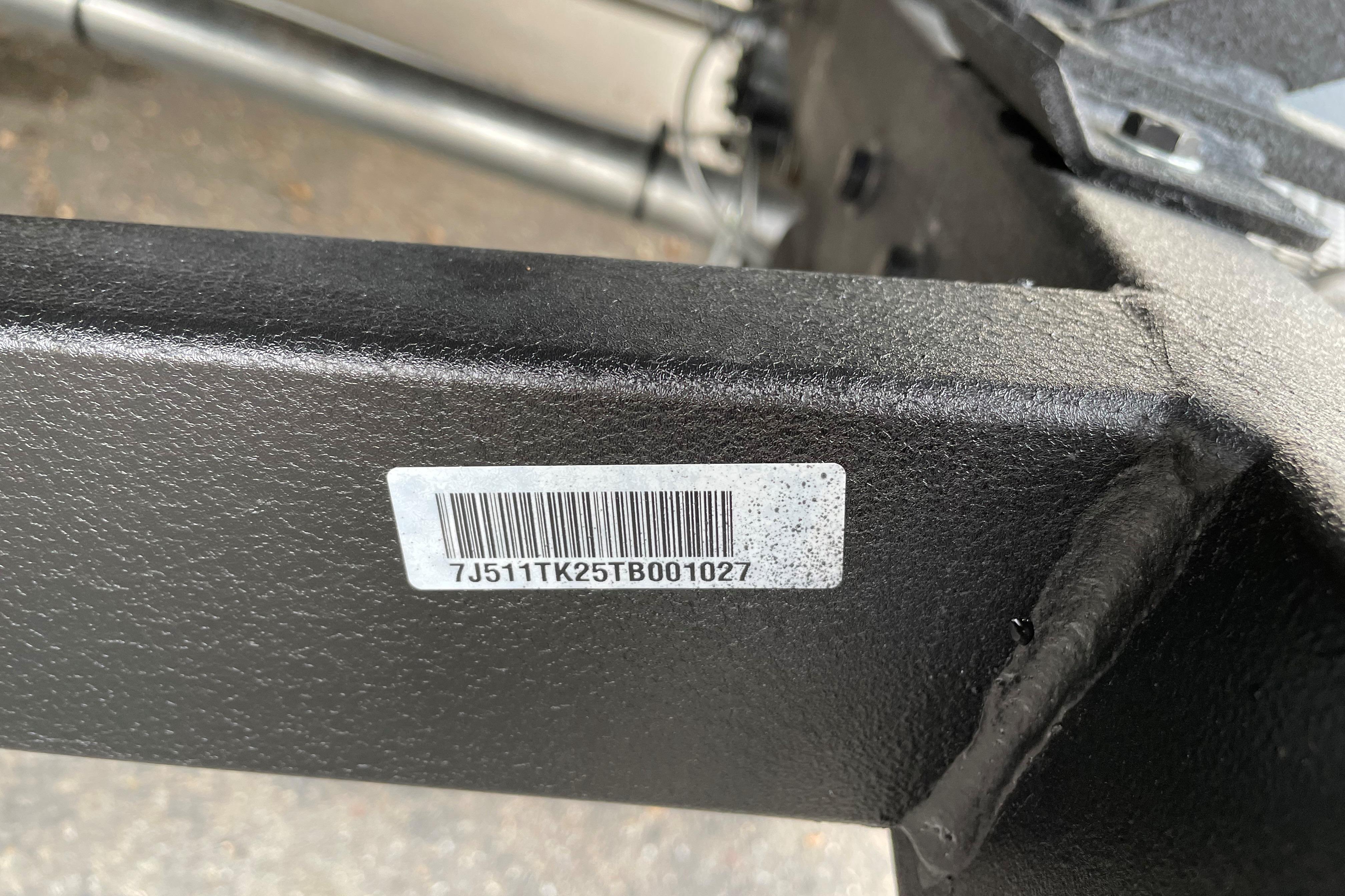 Barcode on 2026 Tracker Targa V-19 WT boat frame, displaying serial number.