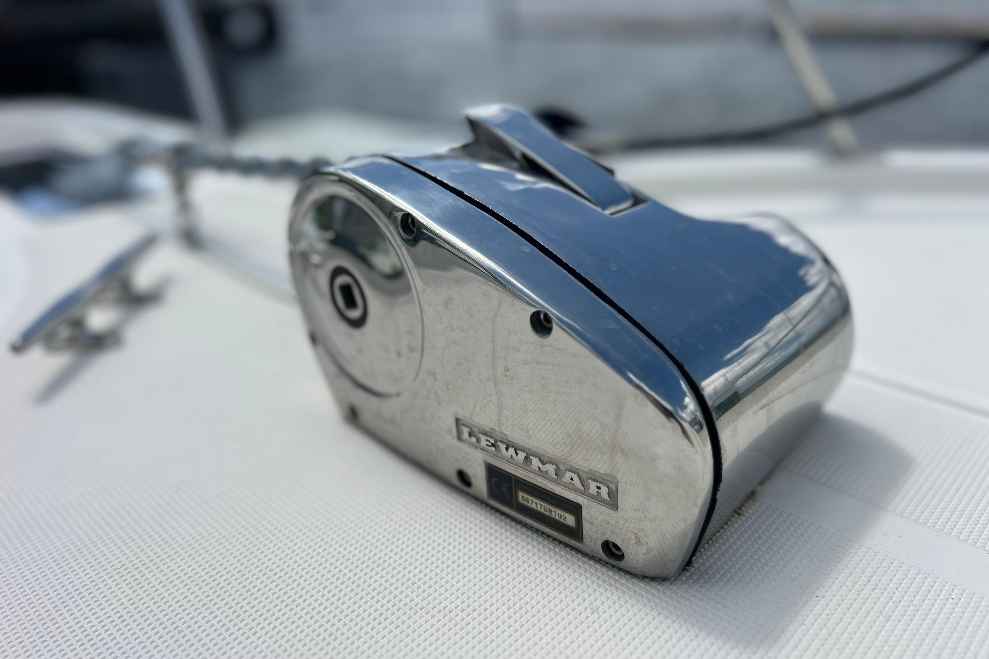 Chrome Lewmar winch on 2004 Pursuit 2870 Walkaround boat deck.