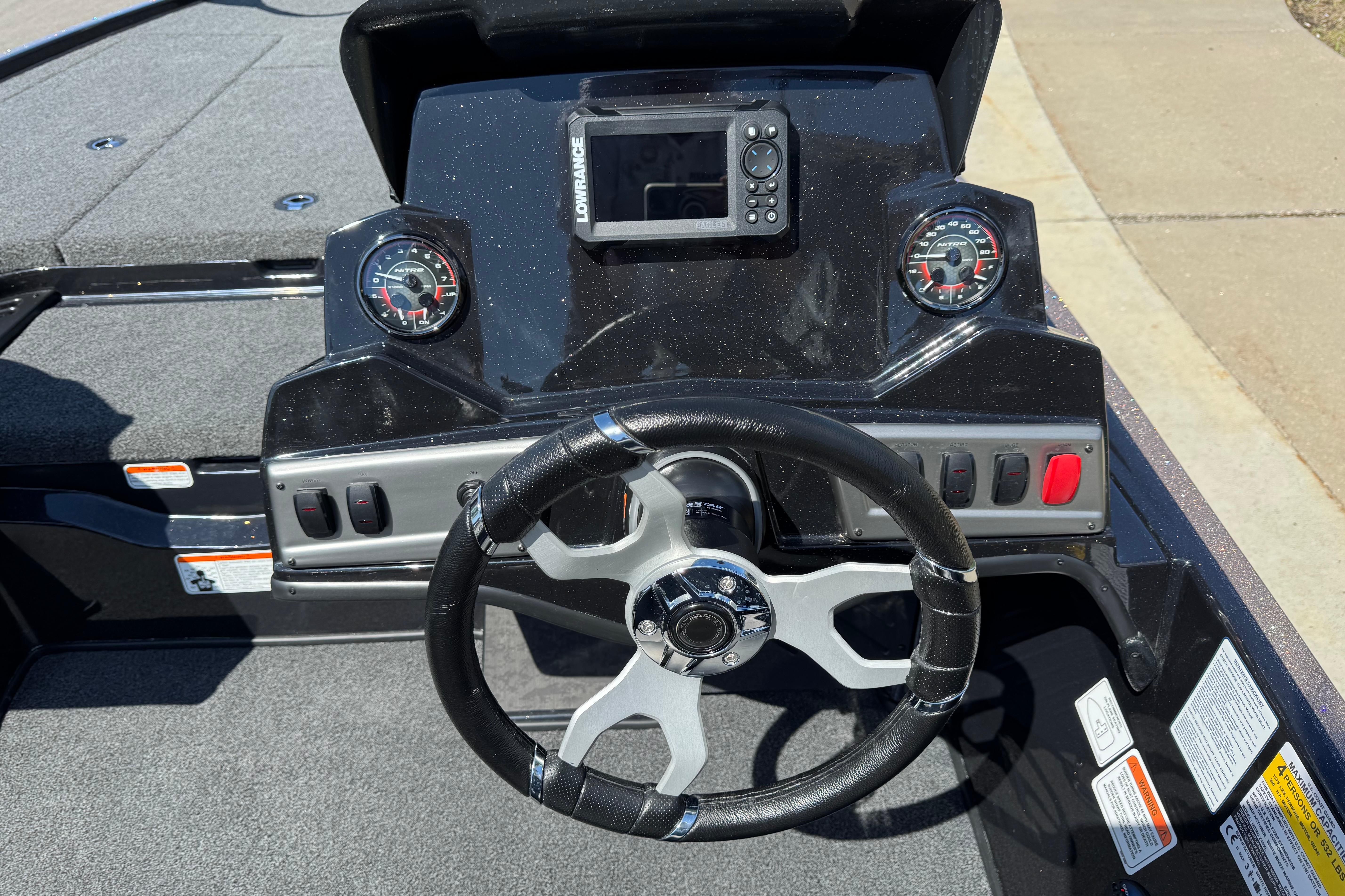 Steering console of 2026 Nitro Z19 XL boat with gauges and navigation system.