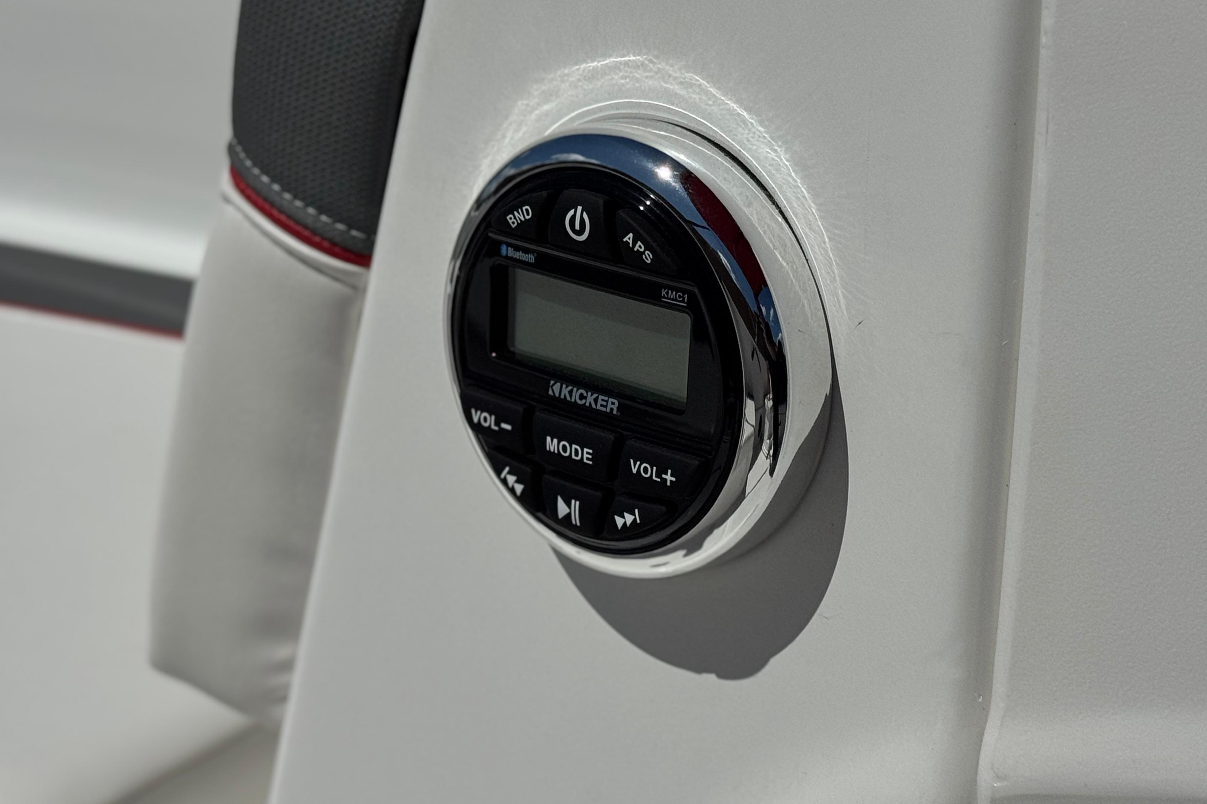2024 Tahoe T16 boat audio control panel with Kicker stereo system.