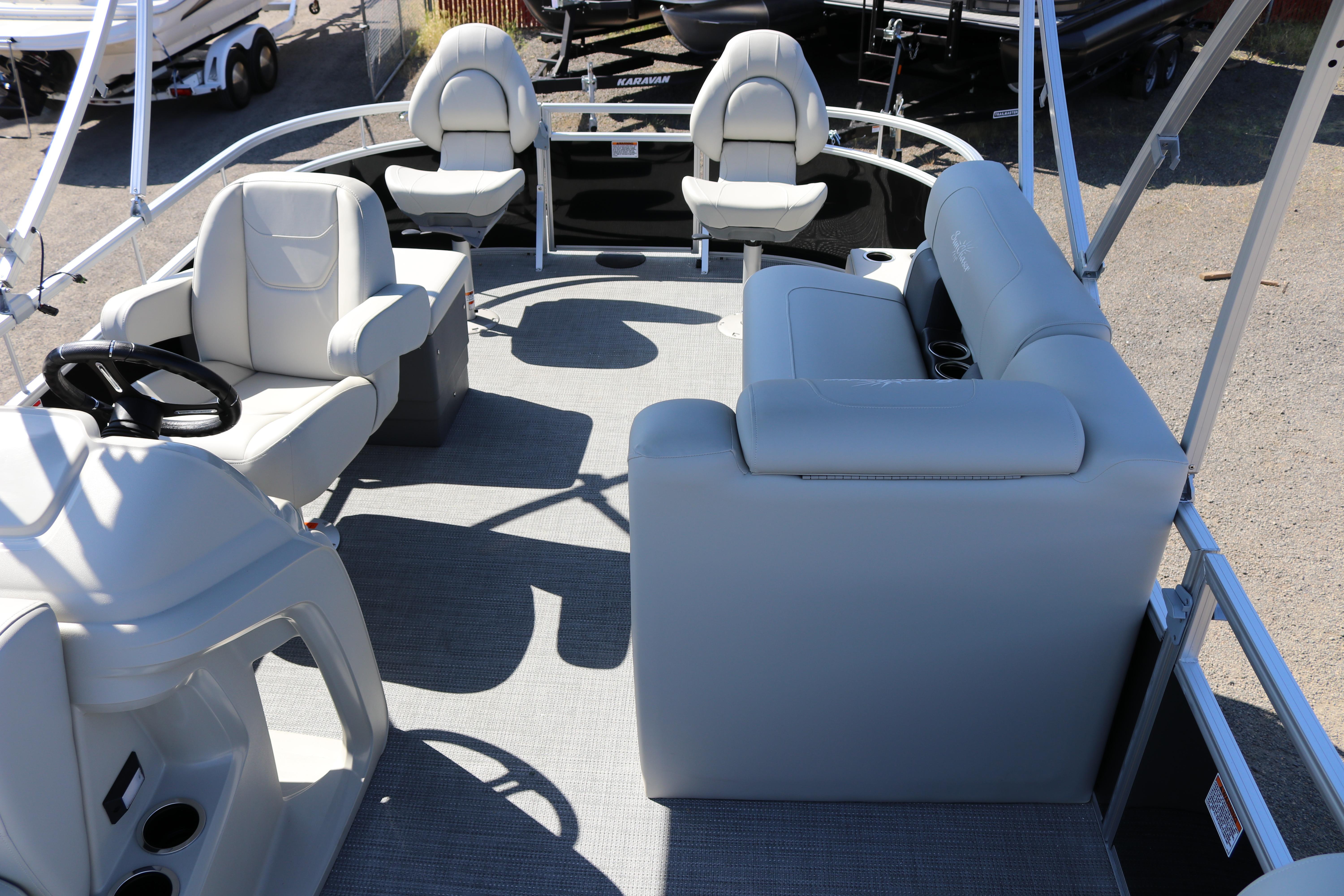 2025 SunChaser Vista 20 Fish pontoon boat interior with seating and steering console.
