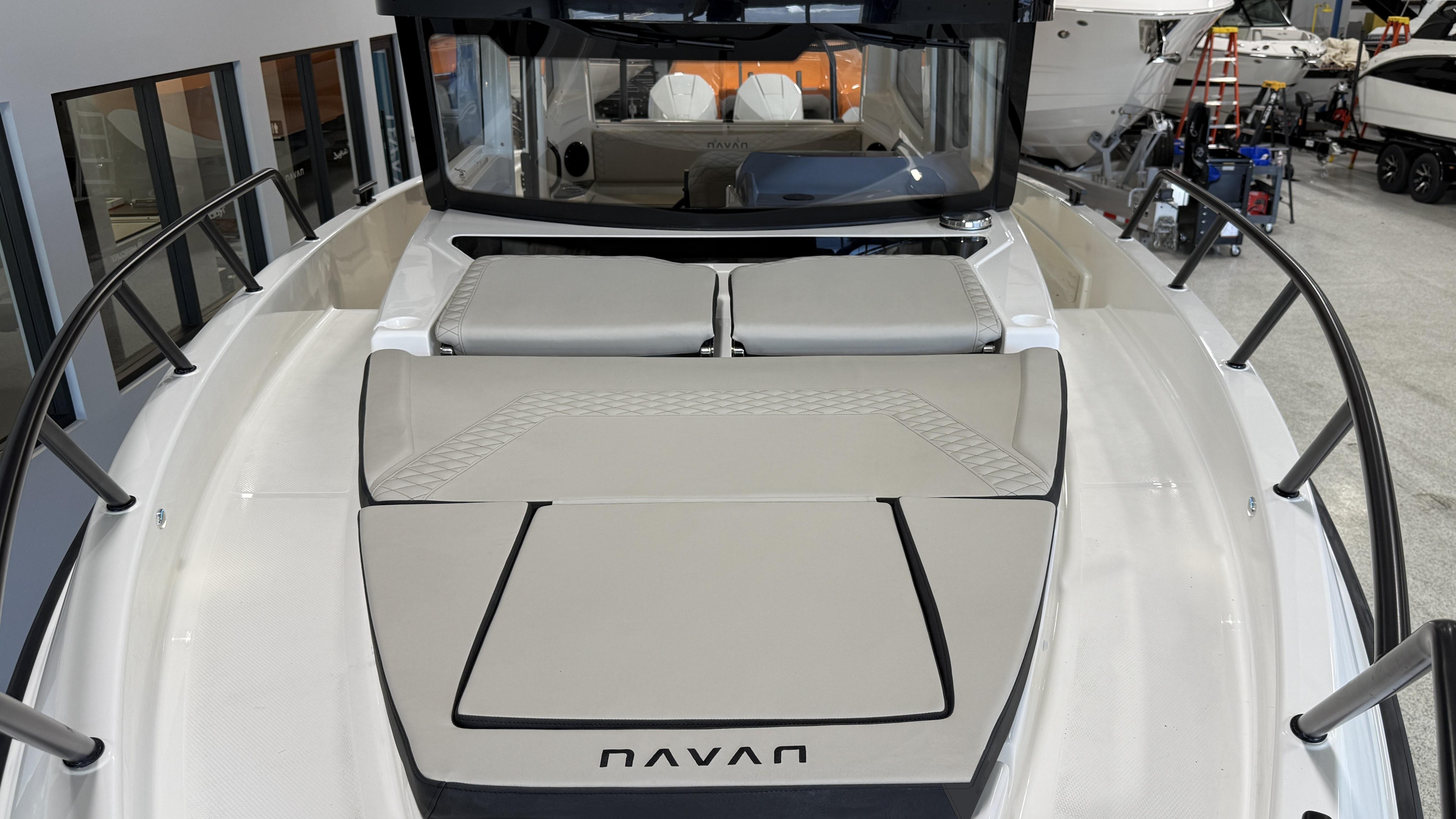2025 Navan C30 boat with sleek design and spacious deck in showroom.