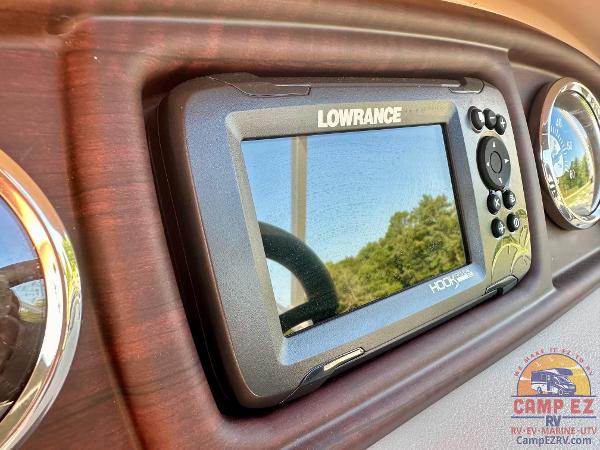 Lowrance fishfinder on 2025 South Bay 224FCR LE boat dashboard.