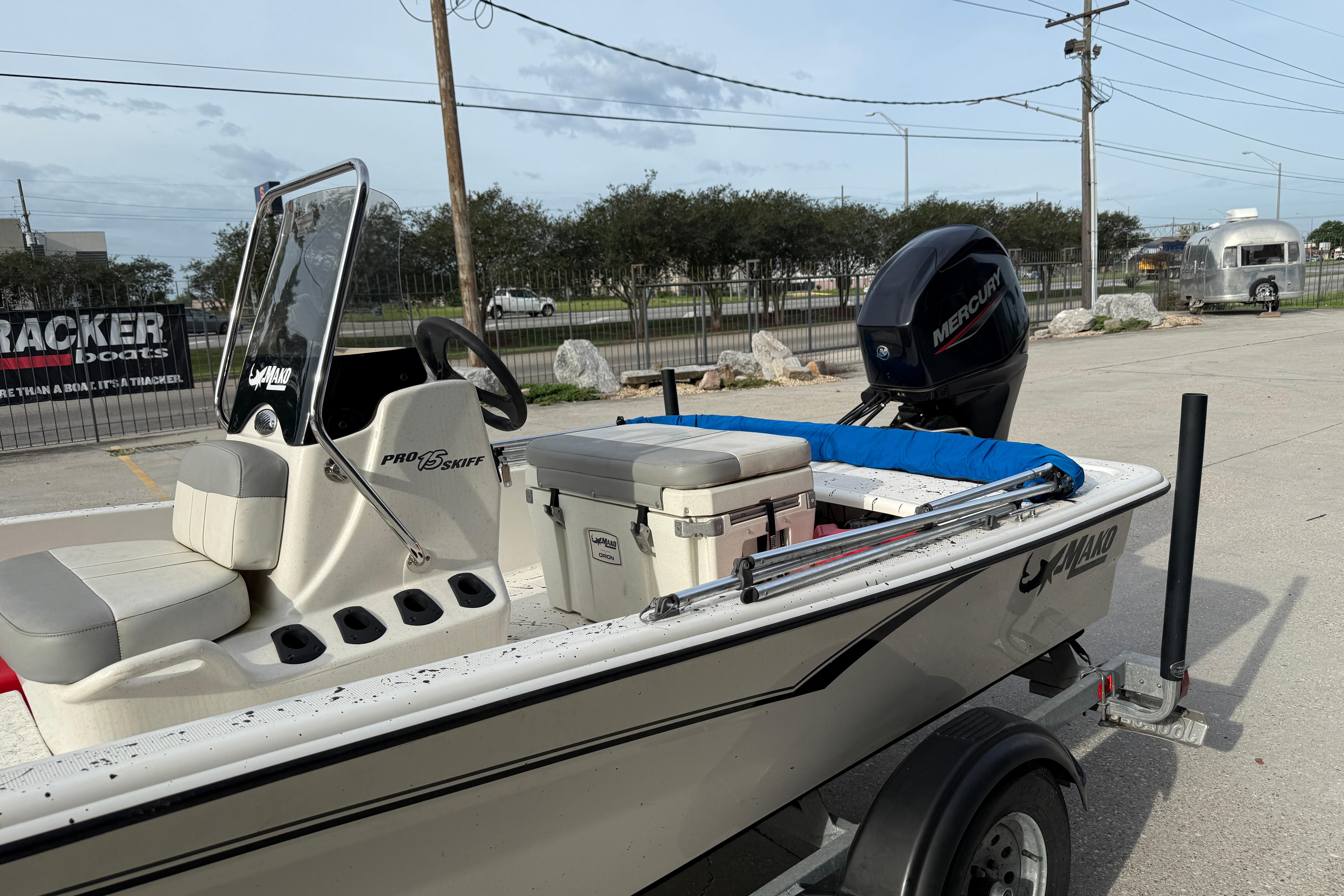 2020 Mako Pro Skiff 15 CC boat with Mercury engine on trailer.