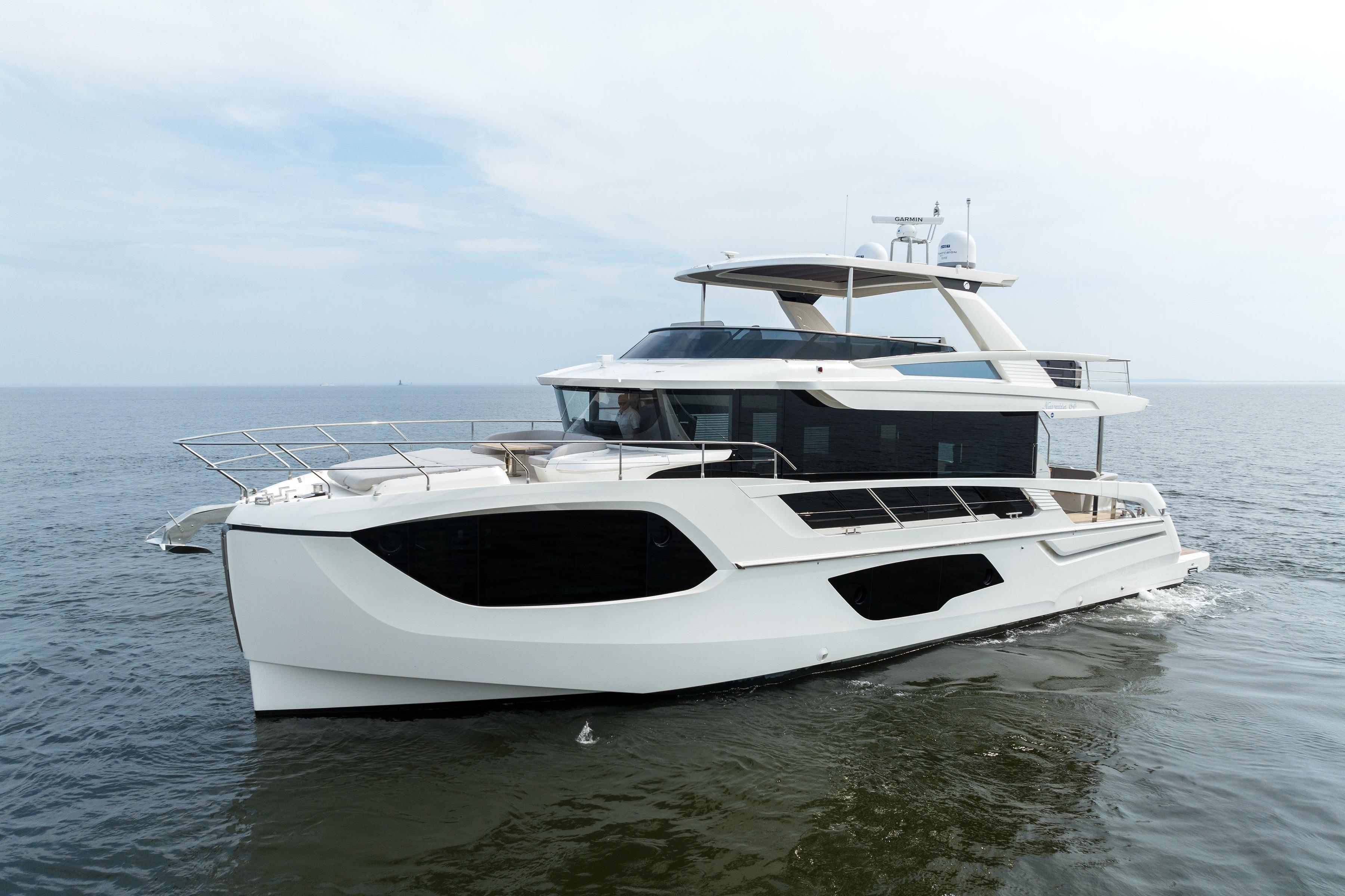 2024 Absolute Navetta 64 yacht cruising on open water.