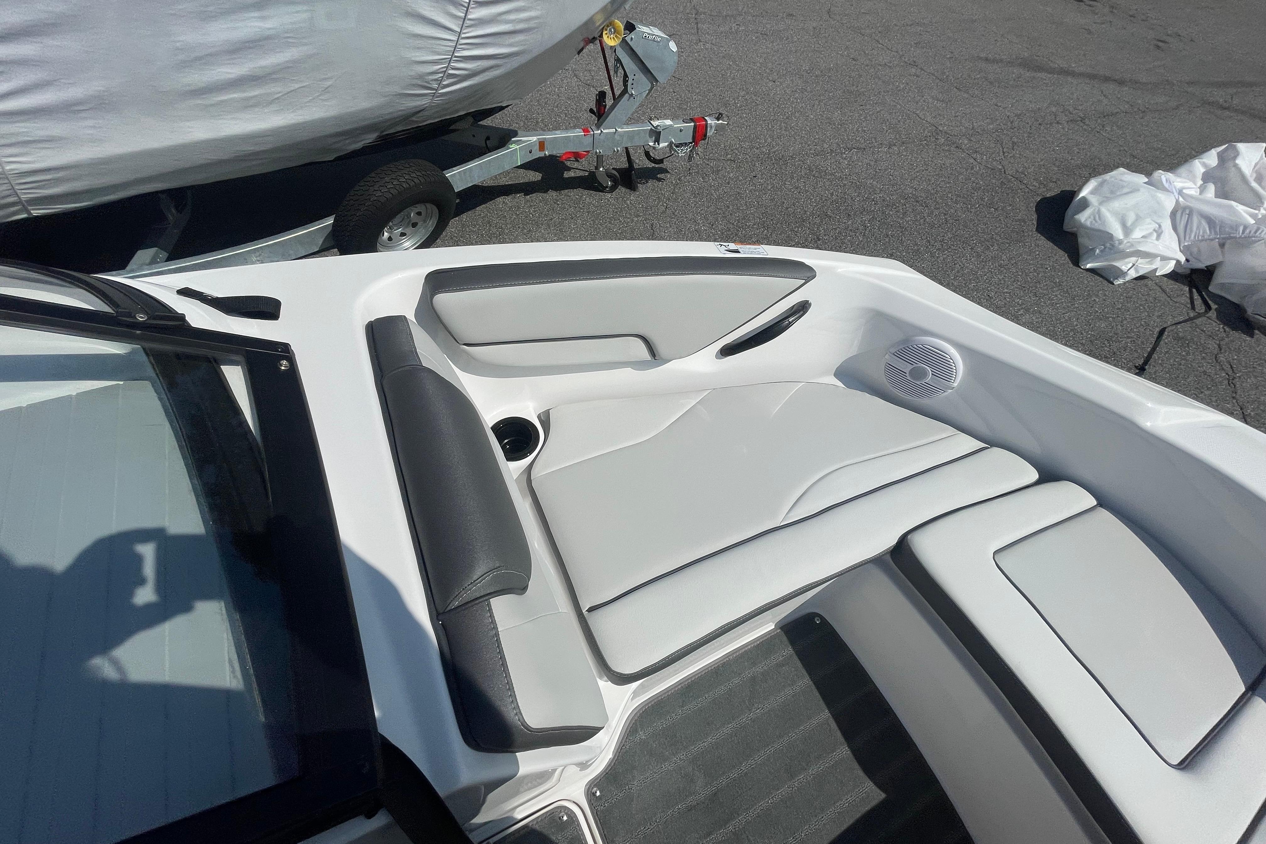 2026 Yamaha Boats AR190 interior with cushioned seating and speaker system.