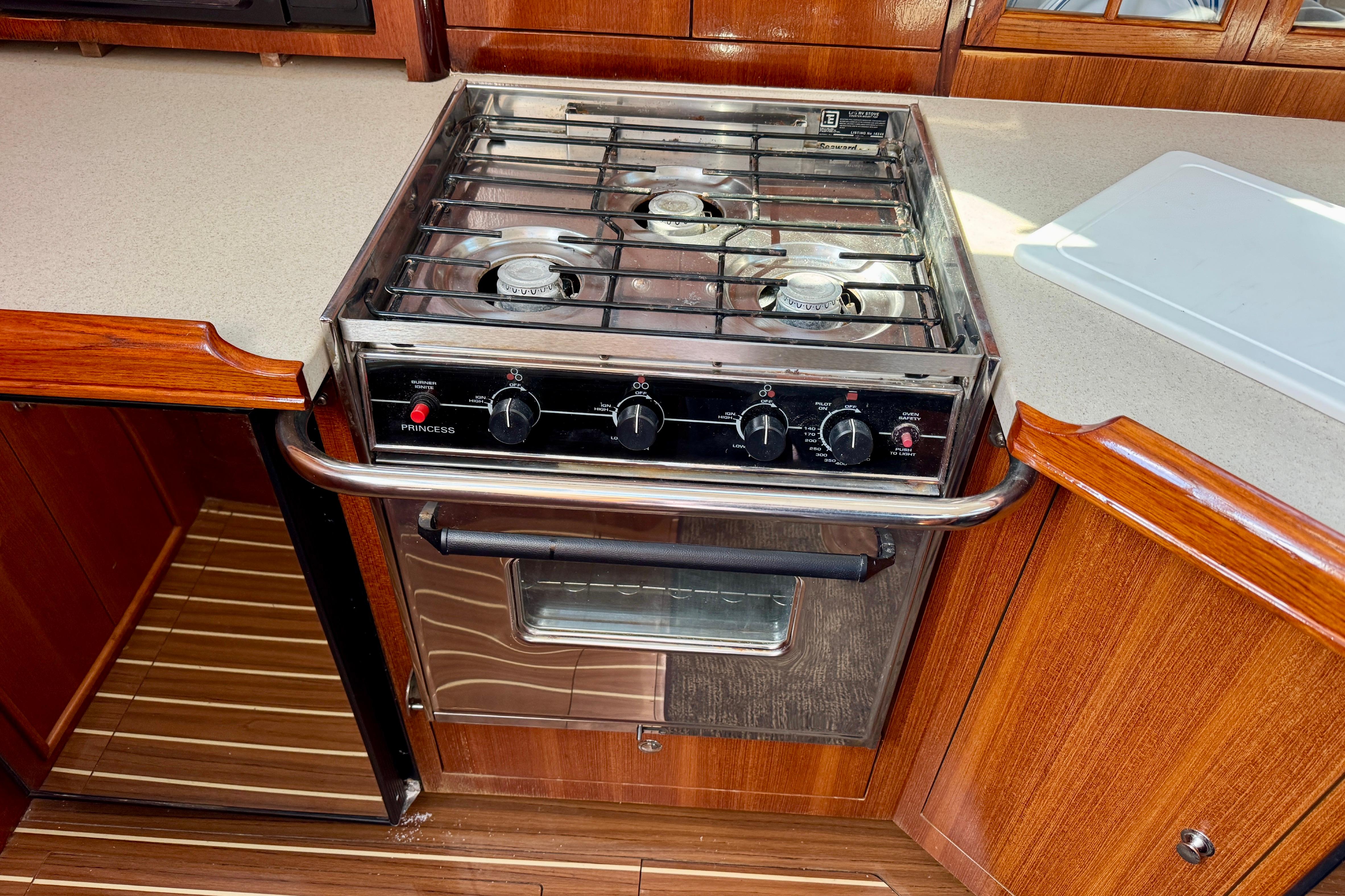 Stainless steel stove in 2007 Hunter 41 Deck Salon yacht kitchen.
