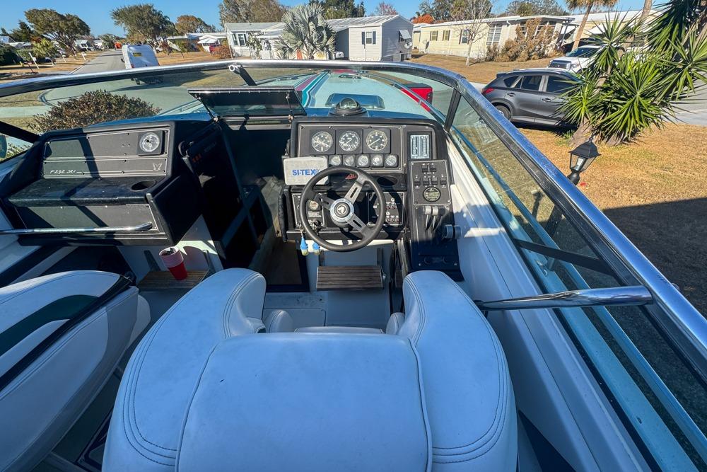 Cockpit of a 1989 Formula 292 SR-1 boat with steering wheel and dashboard controls.