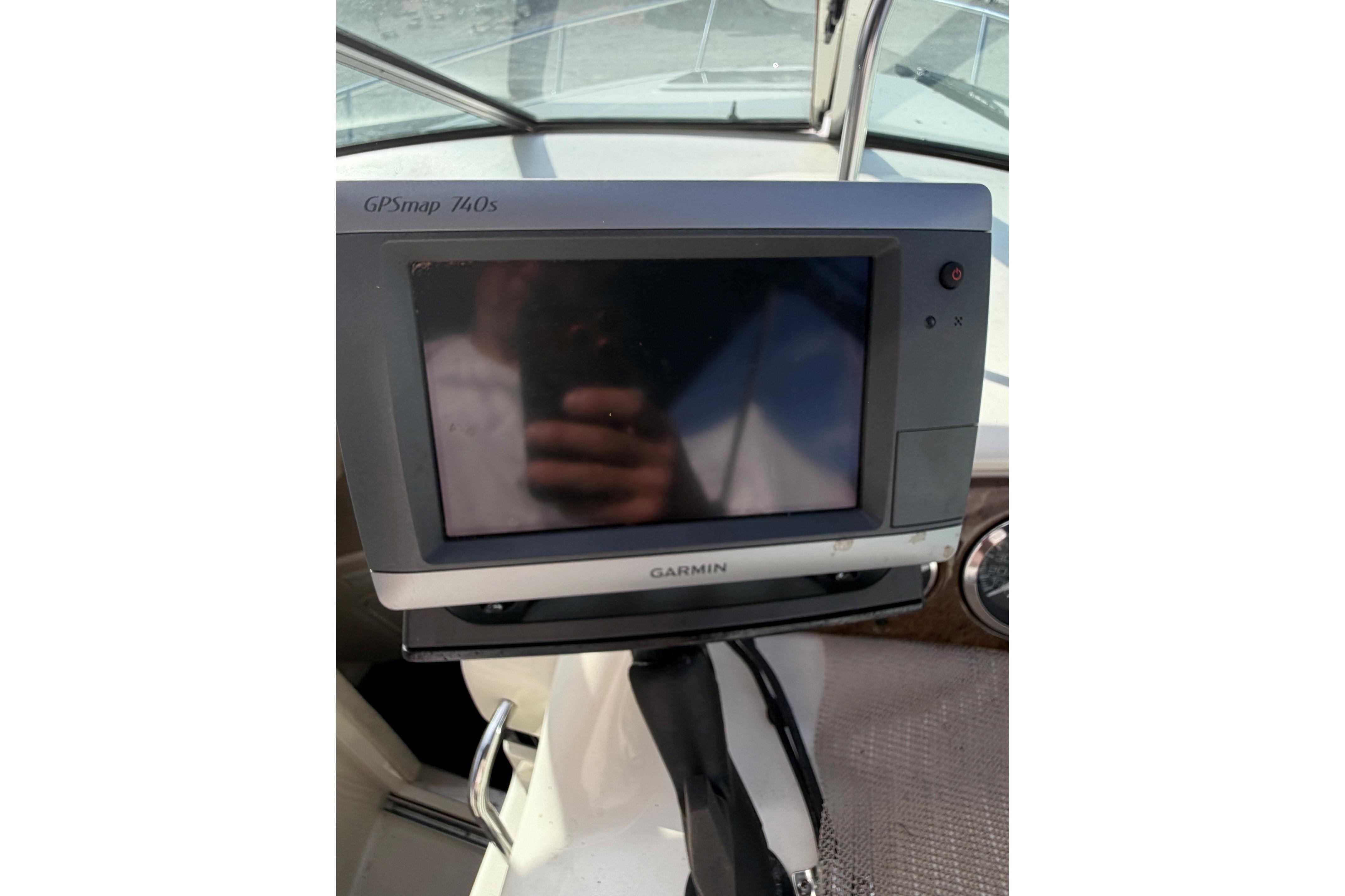 Garmin GPSmap 740s on 2000 Sea Ray 240 Sundancer boat dashboard.