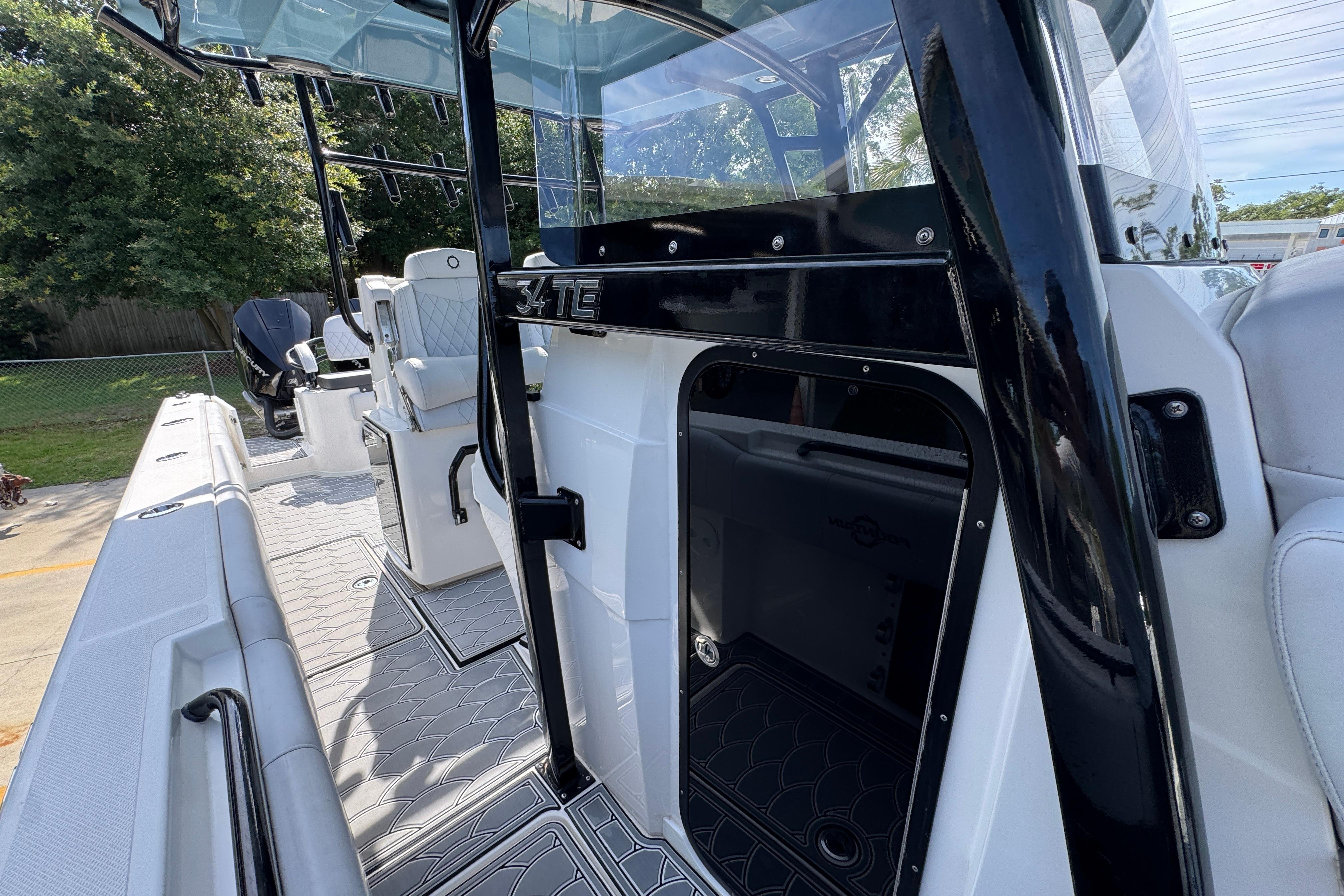 2023 Fountain 34 Tournament Edition boat interior with seating and storage.