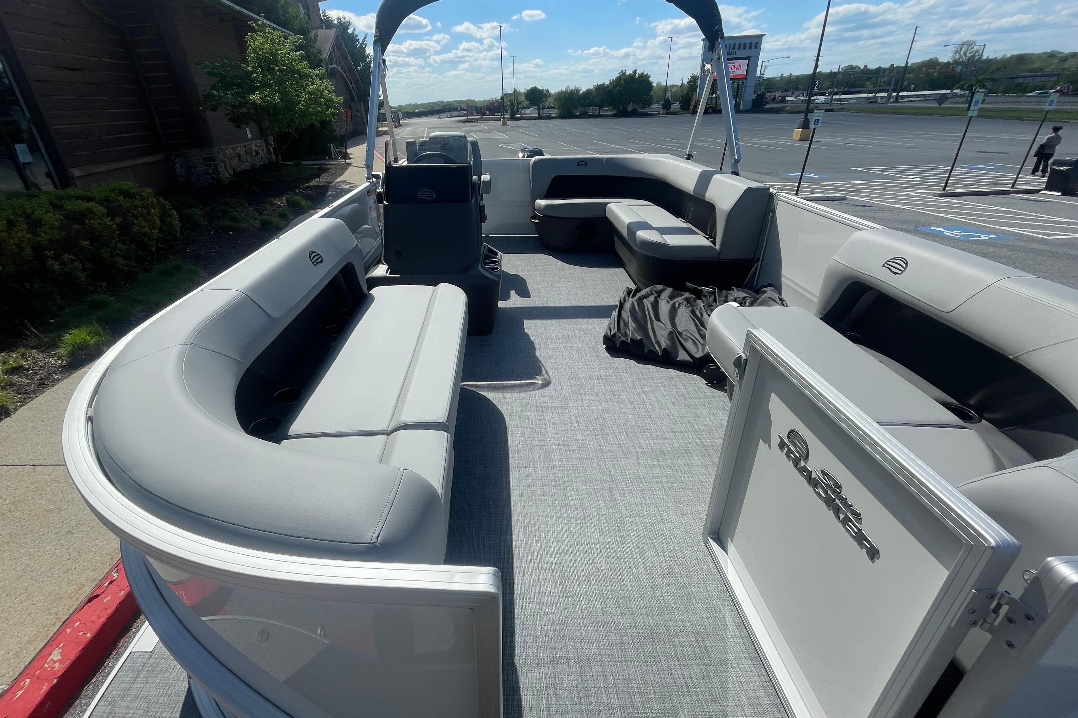 2026 Sun Tracker Party Barge 16 DLX pontoon boat with spacious seating and modern design.