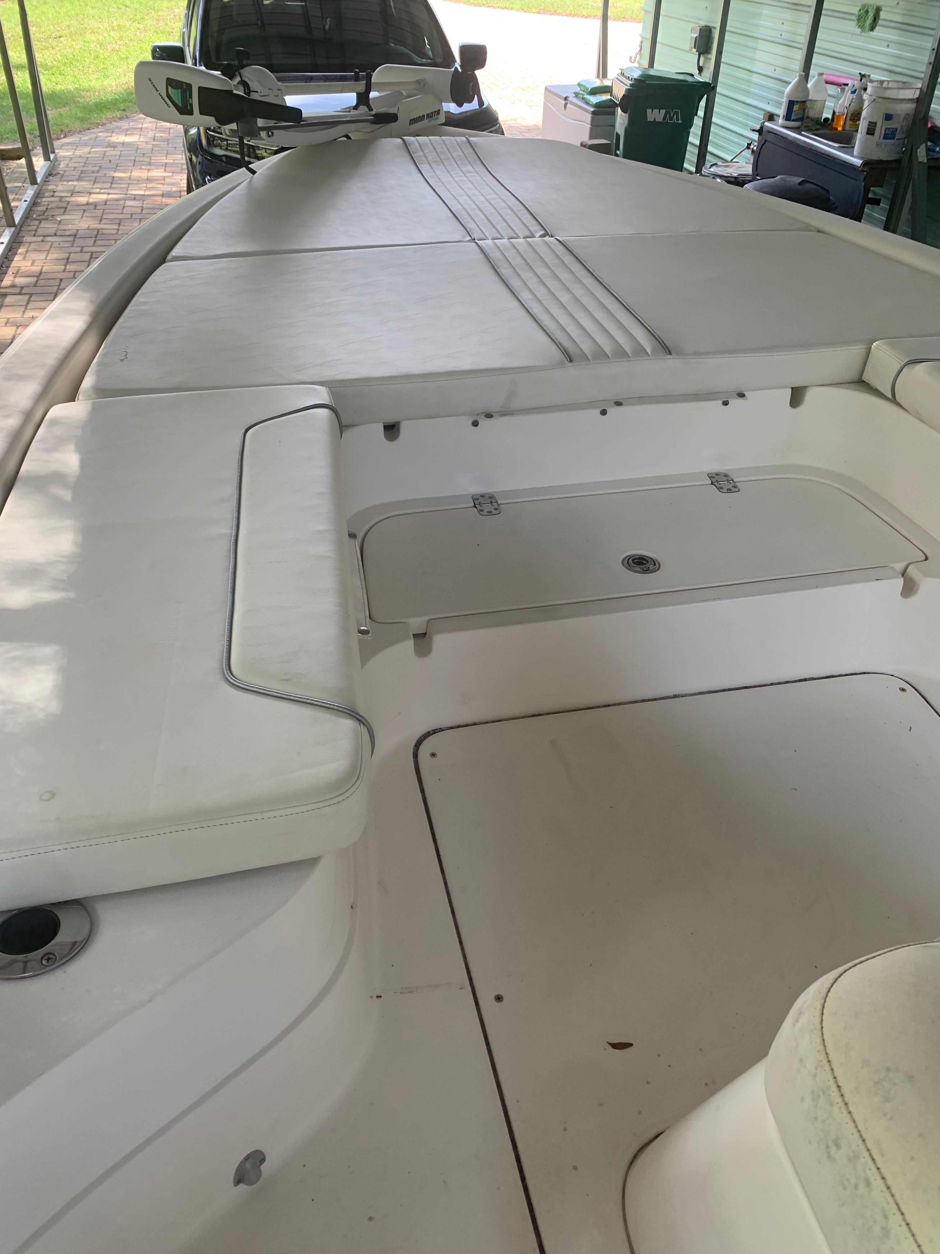 Interior view of a 2007 ShearWater 23 LTZ boat with white upholstery.