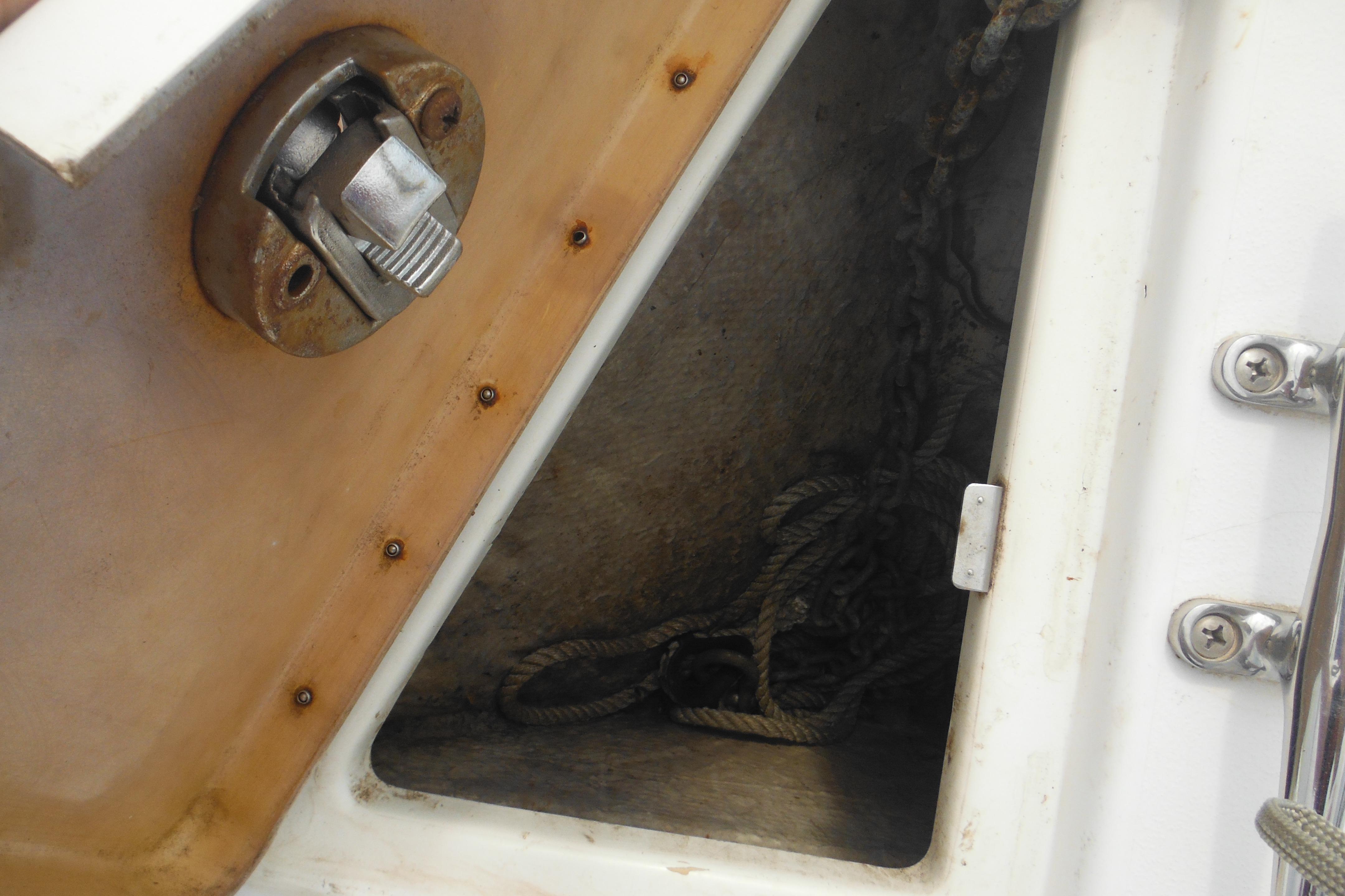 Anchor storage compartment on a 2005 Seaswirl Striper 2101 Walkaround O/B boat.