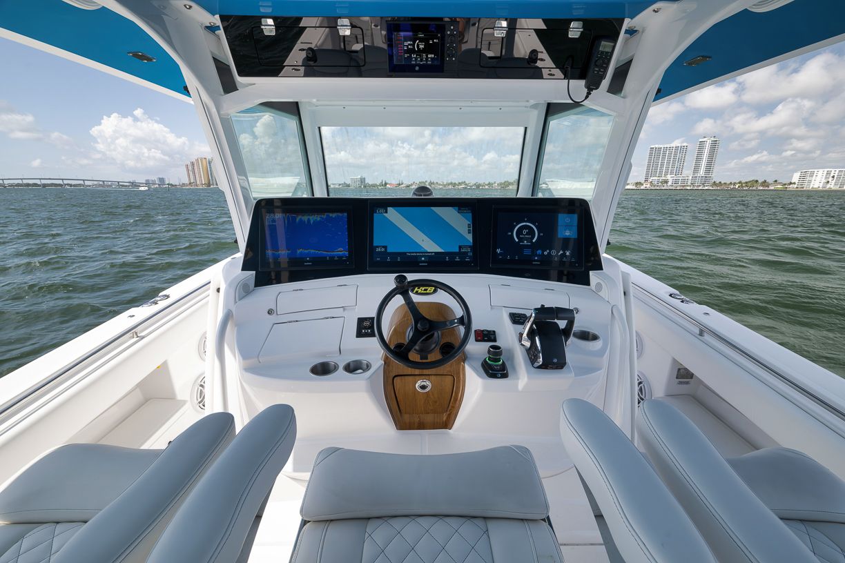 Interior view of 2023 HCB 53 Suenos boat cockpit on the water.
