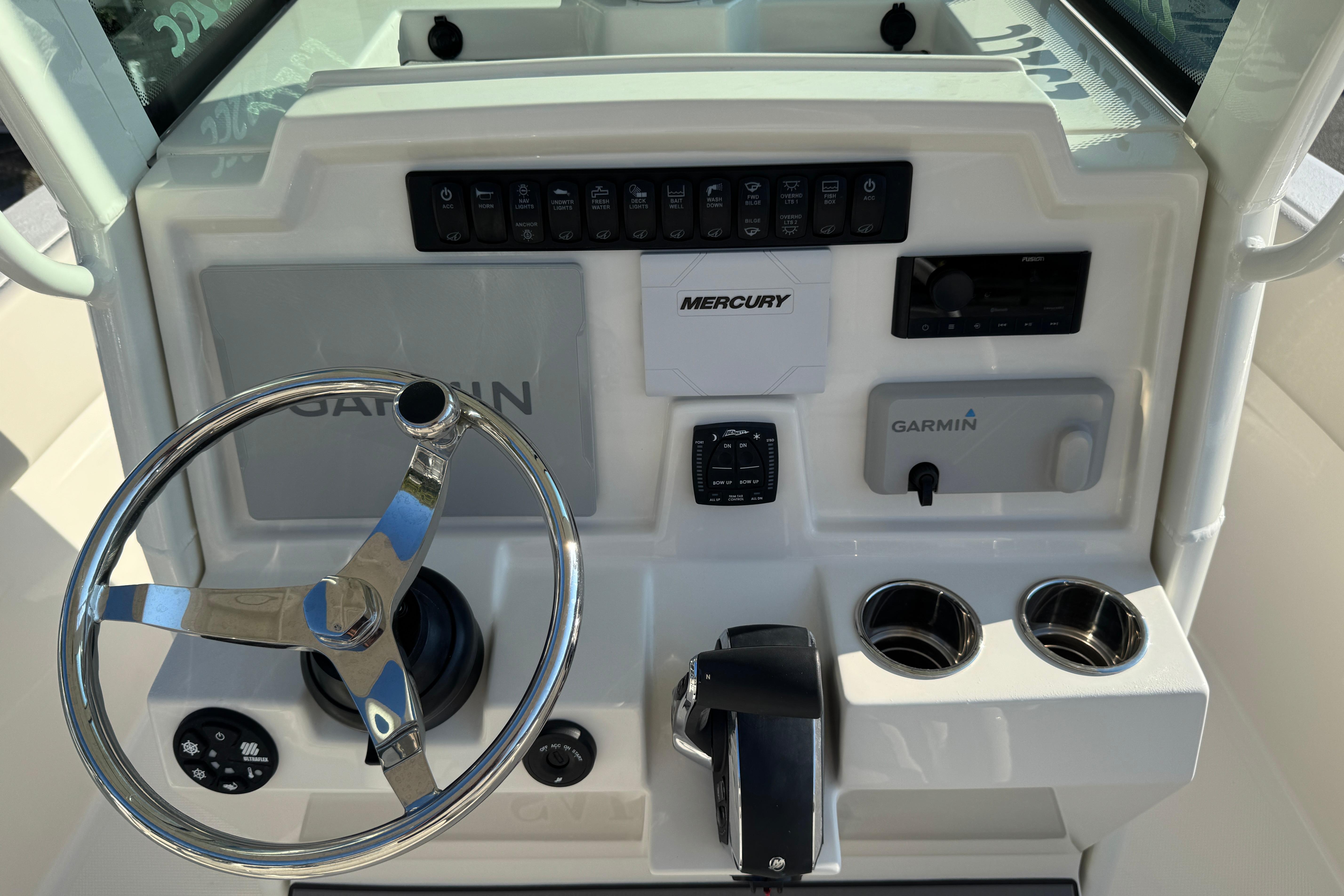 2026 Sailfish 232 CC boat dashboard with Garmin and Mercury controls.