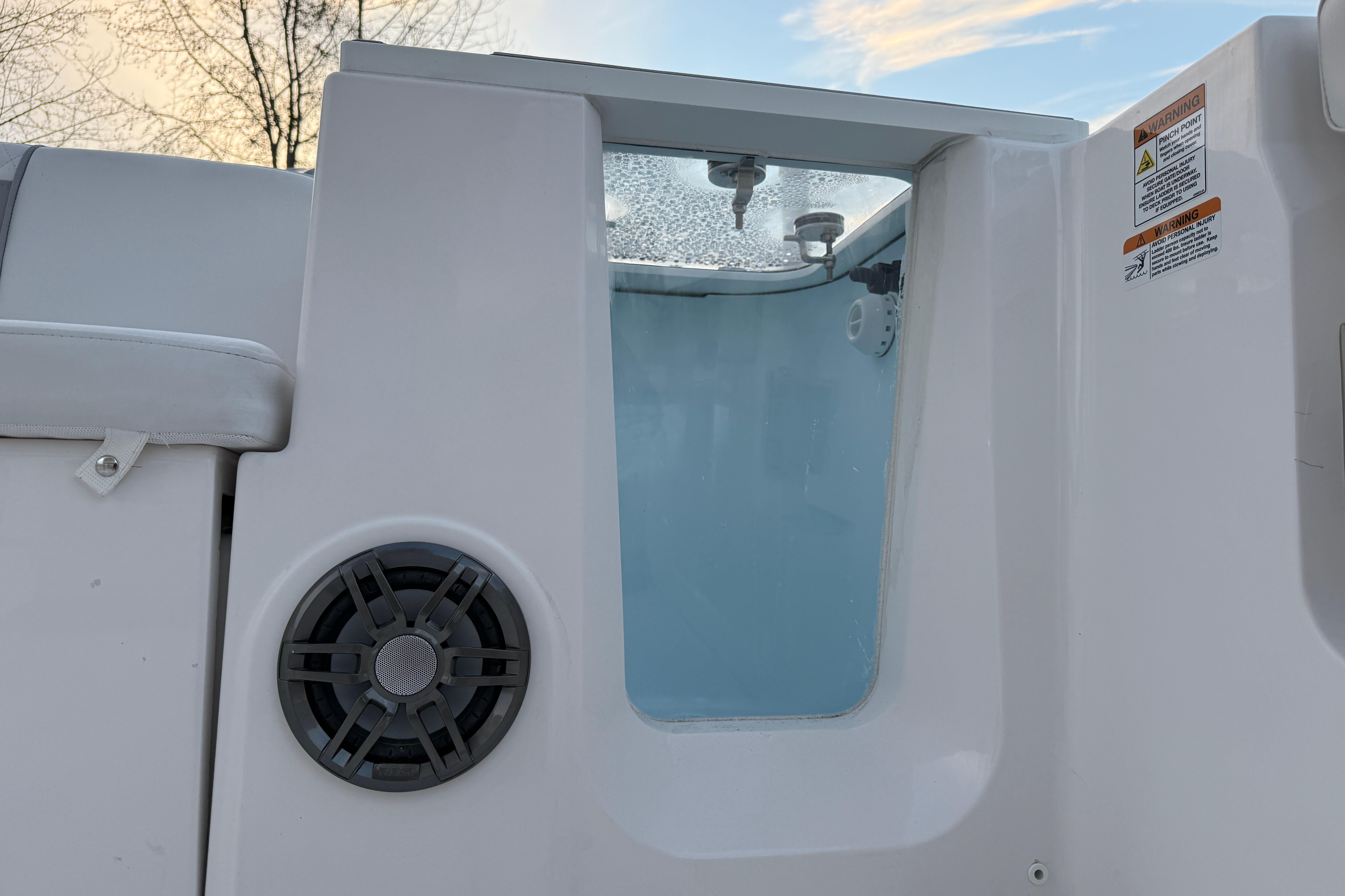 2026 Sea Fox 268 Commander boat interior with speaker and storage compartment.