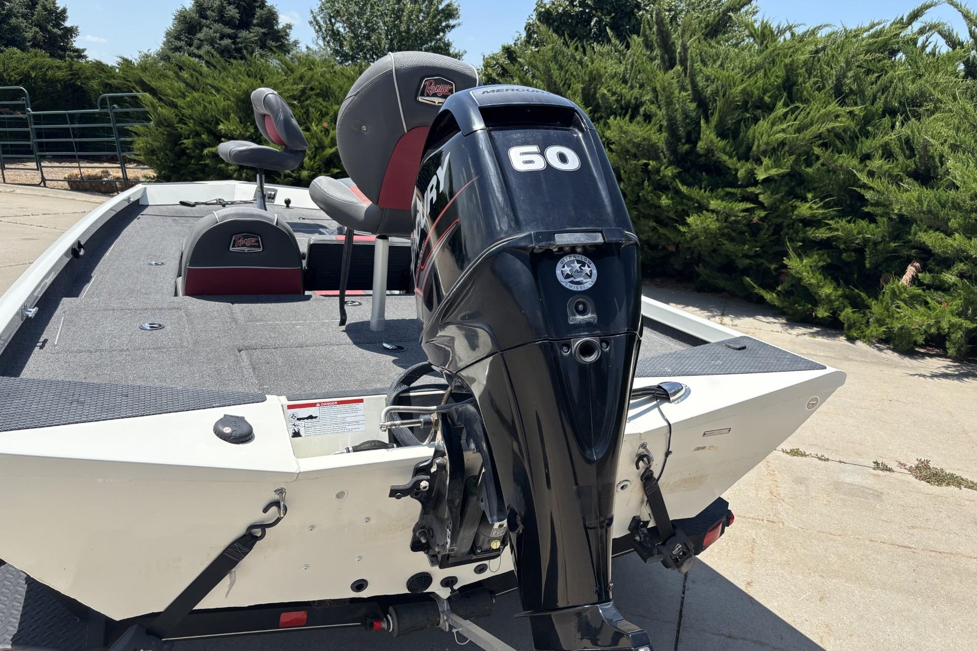 2017 Ranger RT178C boat with Mercury 60 engine, parked outdoors.