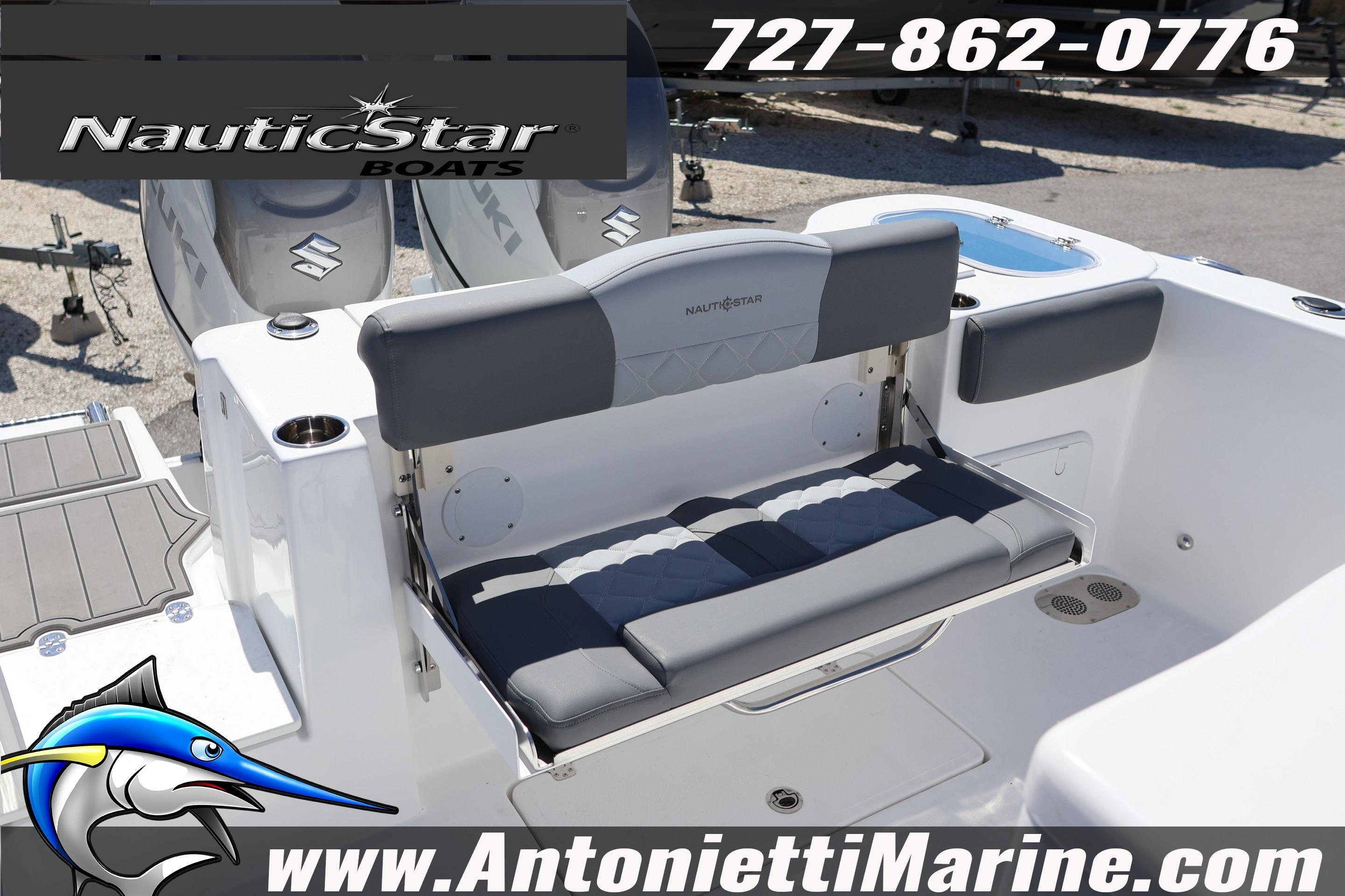 2026 NauticStar 292 Legacy boat interior with seating and branding details.