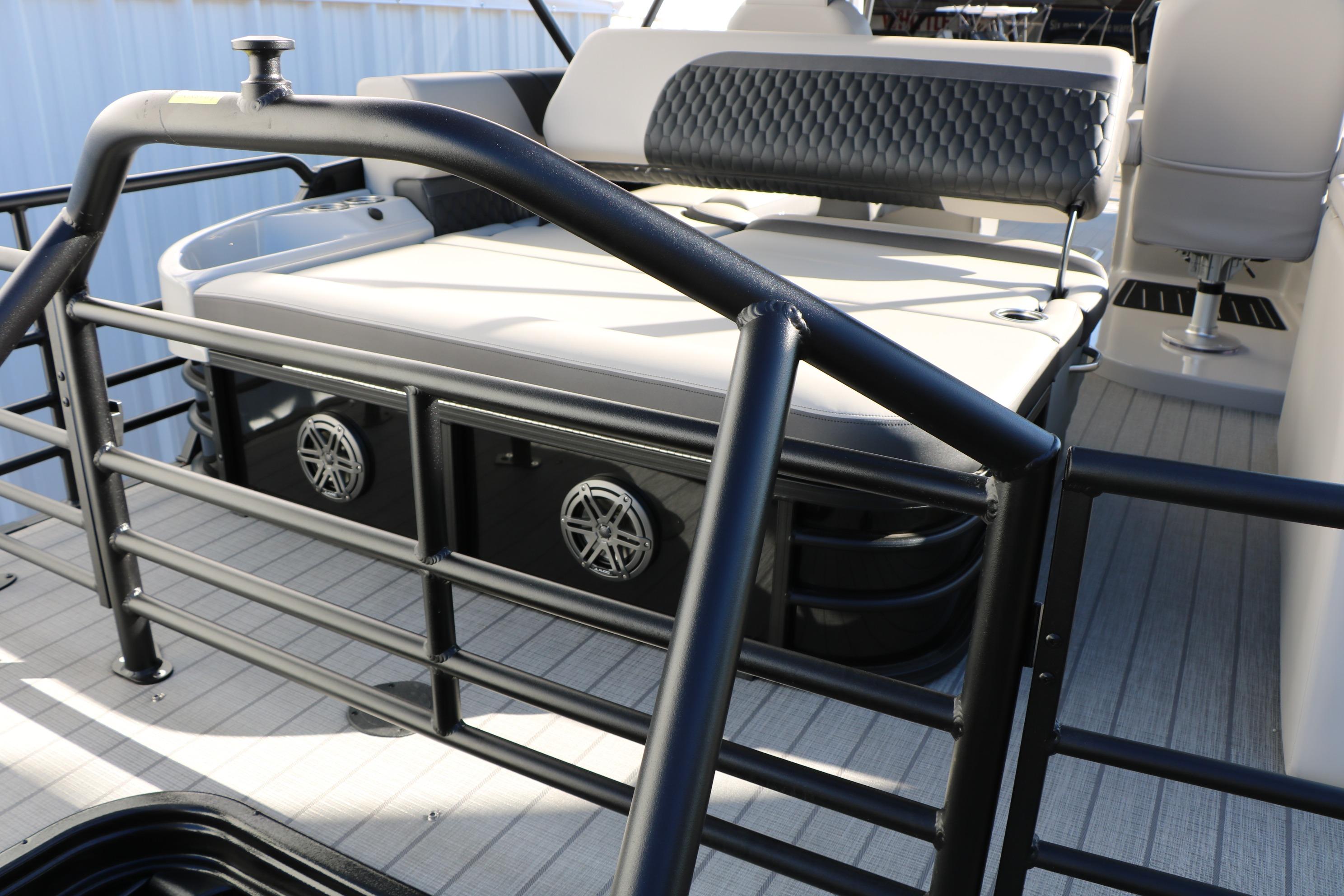 2026 Sylvan L3 CLZ DH boat interior with cushioned seating and sleek railing design.