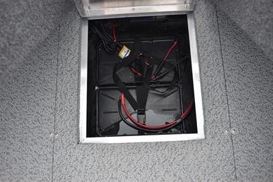 2026 Lowe Fishing Machine 1675 WT battery compartment with wiring.