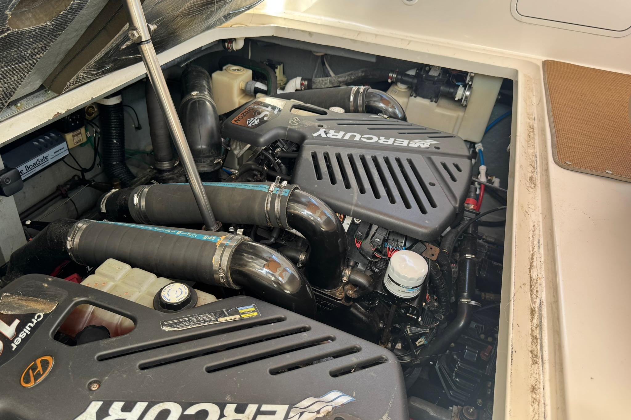 Engine compartment of a 2001 Sea Ray 340 Sundancer with MerCruiser engines.
