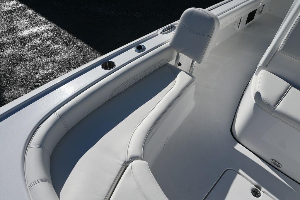 2026 Tidewater 2500 Carolina Bay boat interior with white cushioned seating.
