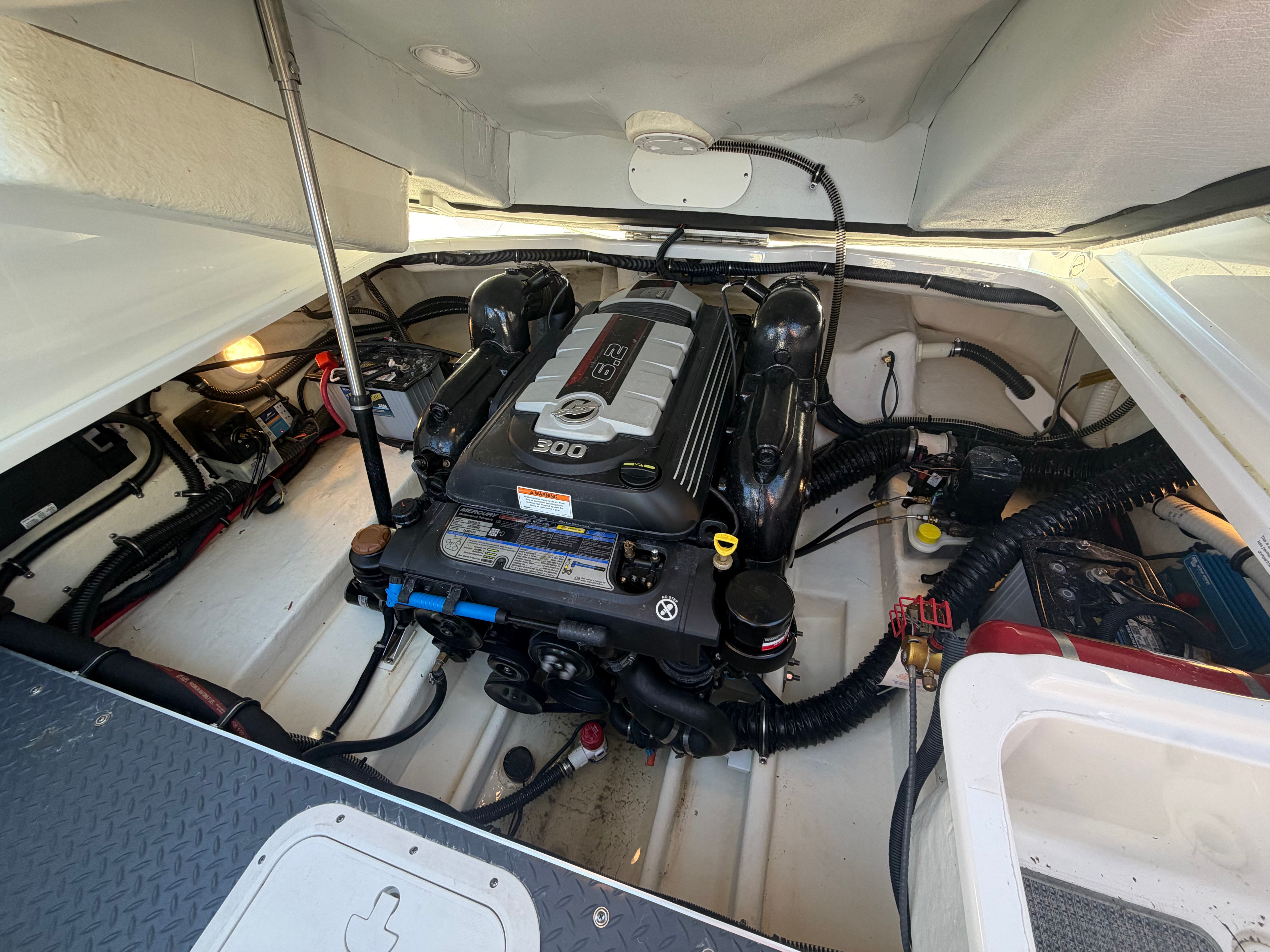Engine compartment of a 2019 Formula 240 boat with 6.2L engine.