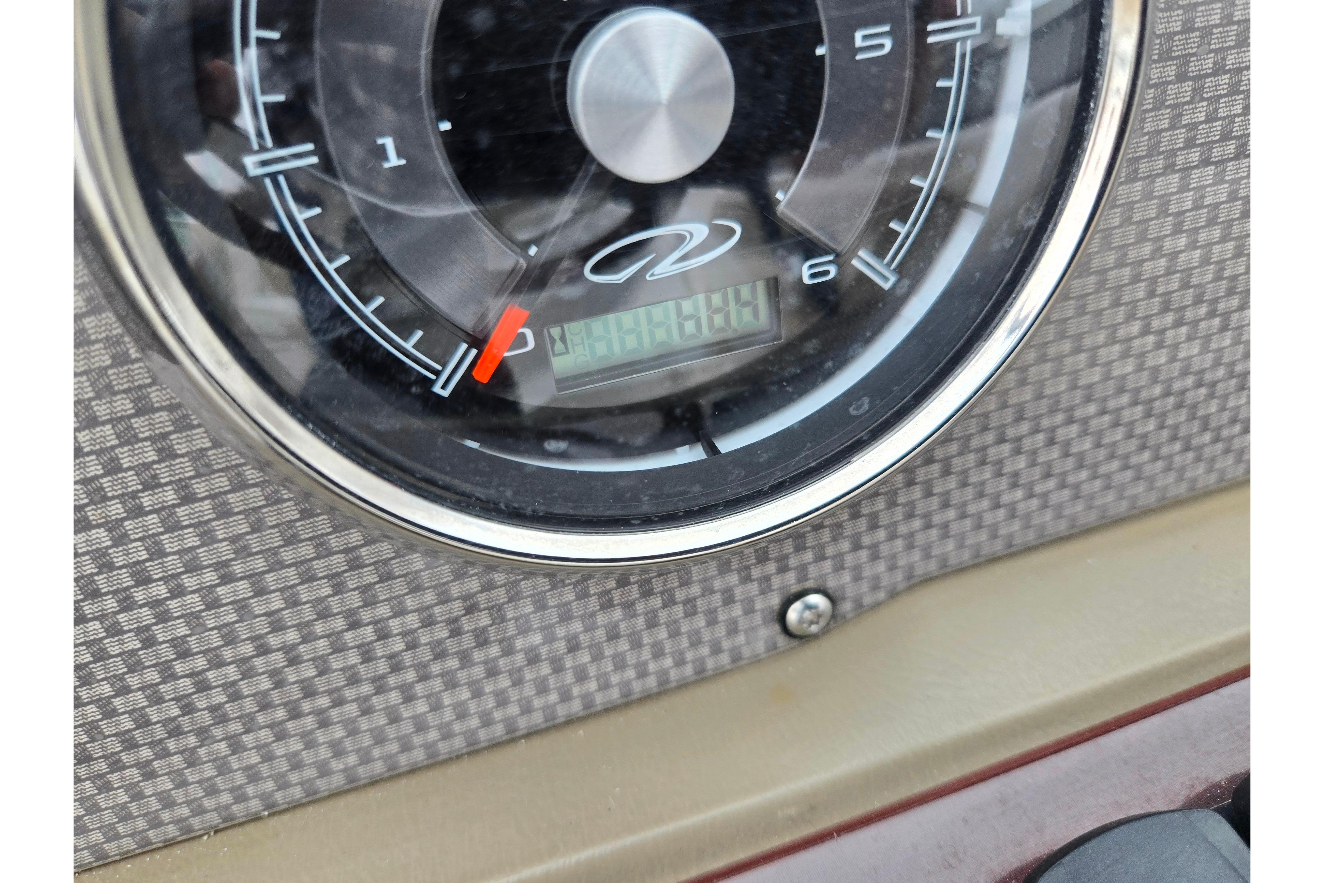 Close-up of 2015 Regal 1900 ES Bowrider speedometer with digital display.