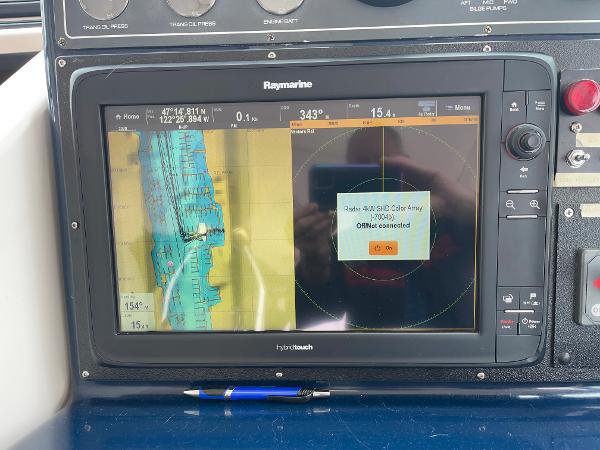 Raymarine navigation display on 2003 Tiara Yachts 3500 Open, showing map and radar.