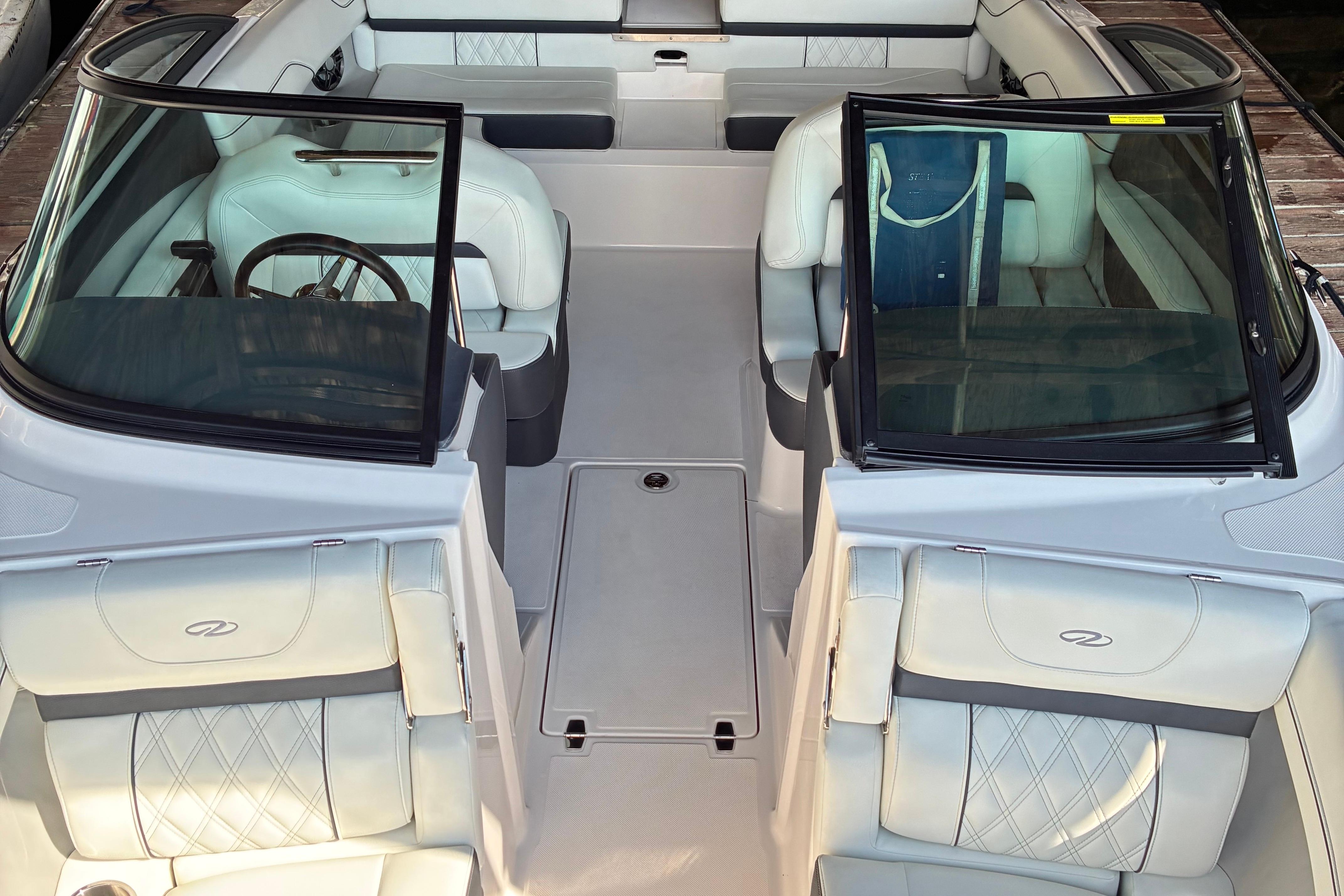 2025 Regal LS2 boat interior with luxurious white seating and modern design.