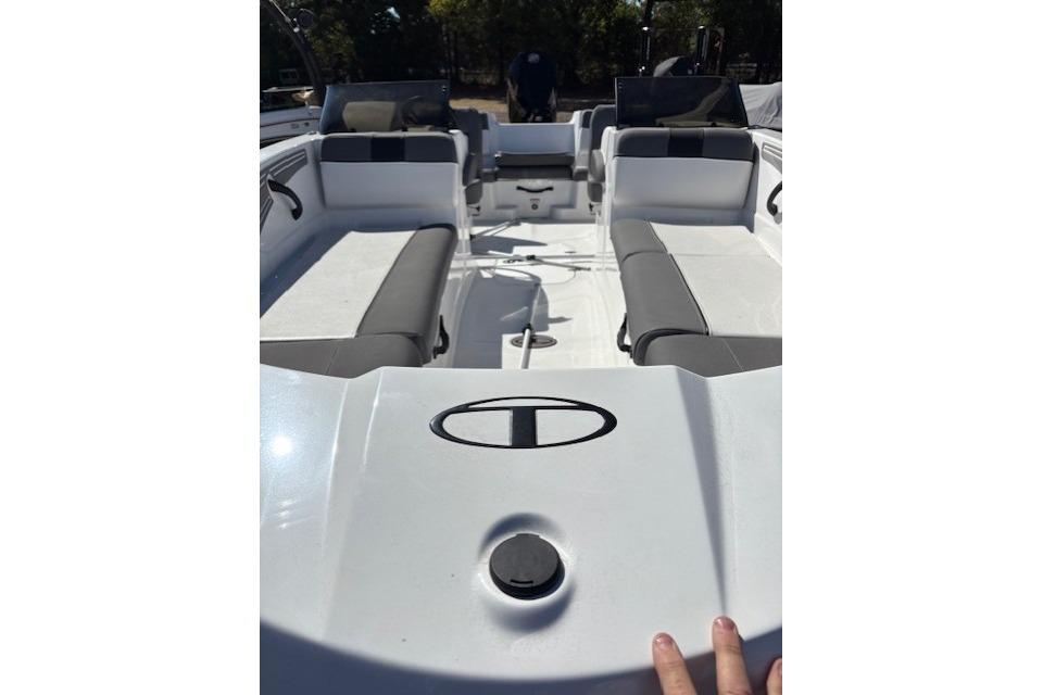 2025 Tahoe T21 boat interior with seating and dashboard view.