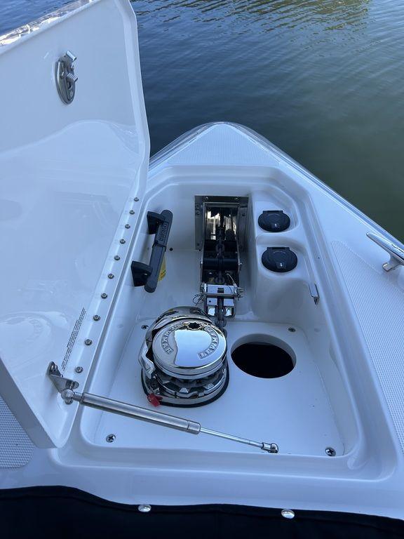 2025 Formula 310 Bowrider anchor compartment with winch and storage features.