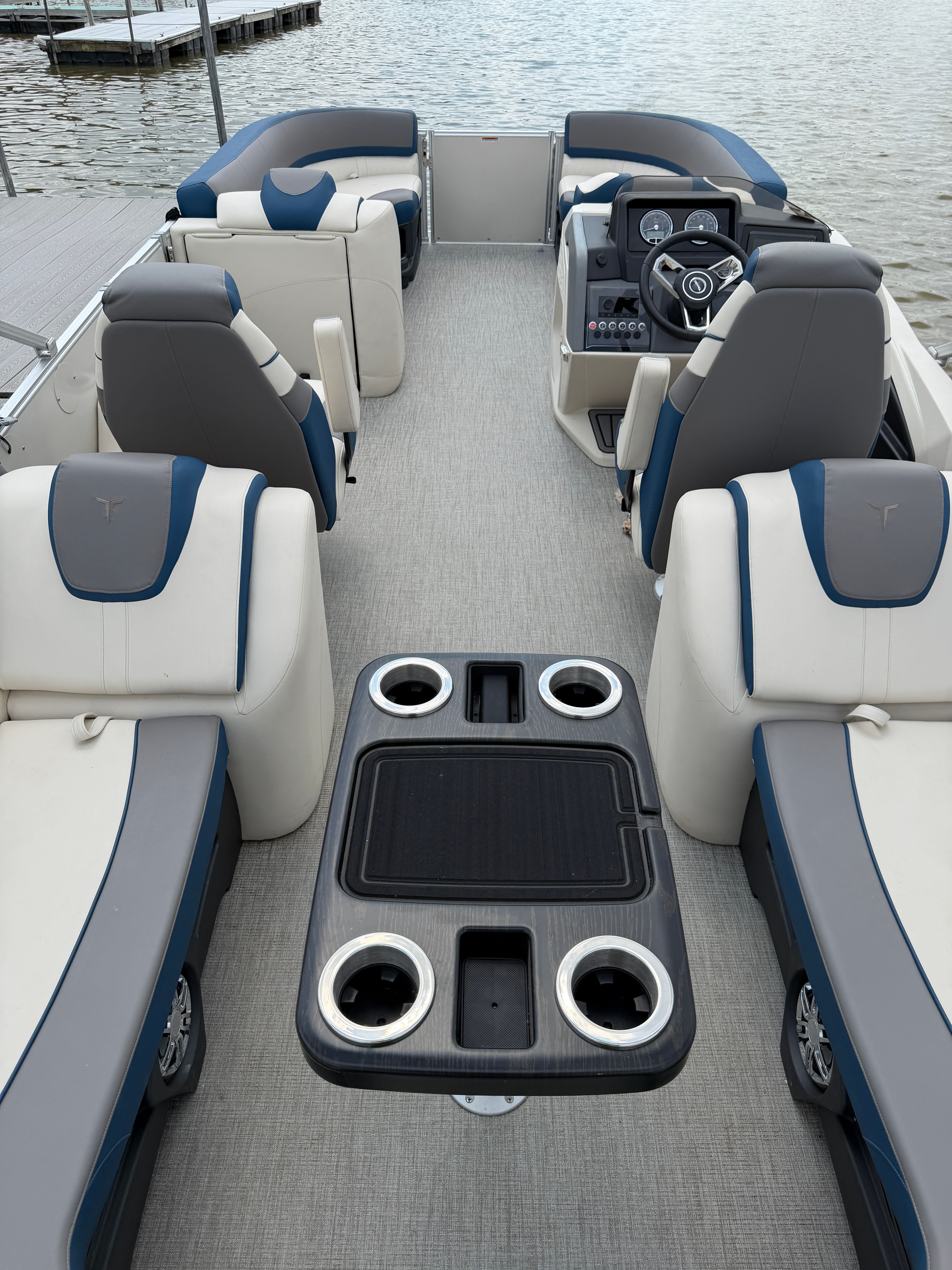 Interior of 2024 Tahoe Pontoon Cascade Quad Lounger with luxurious seating.