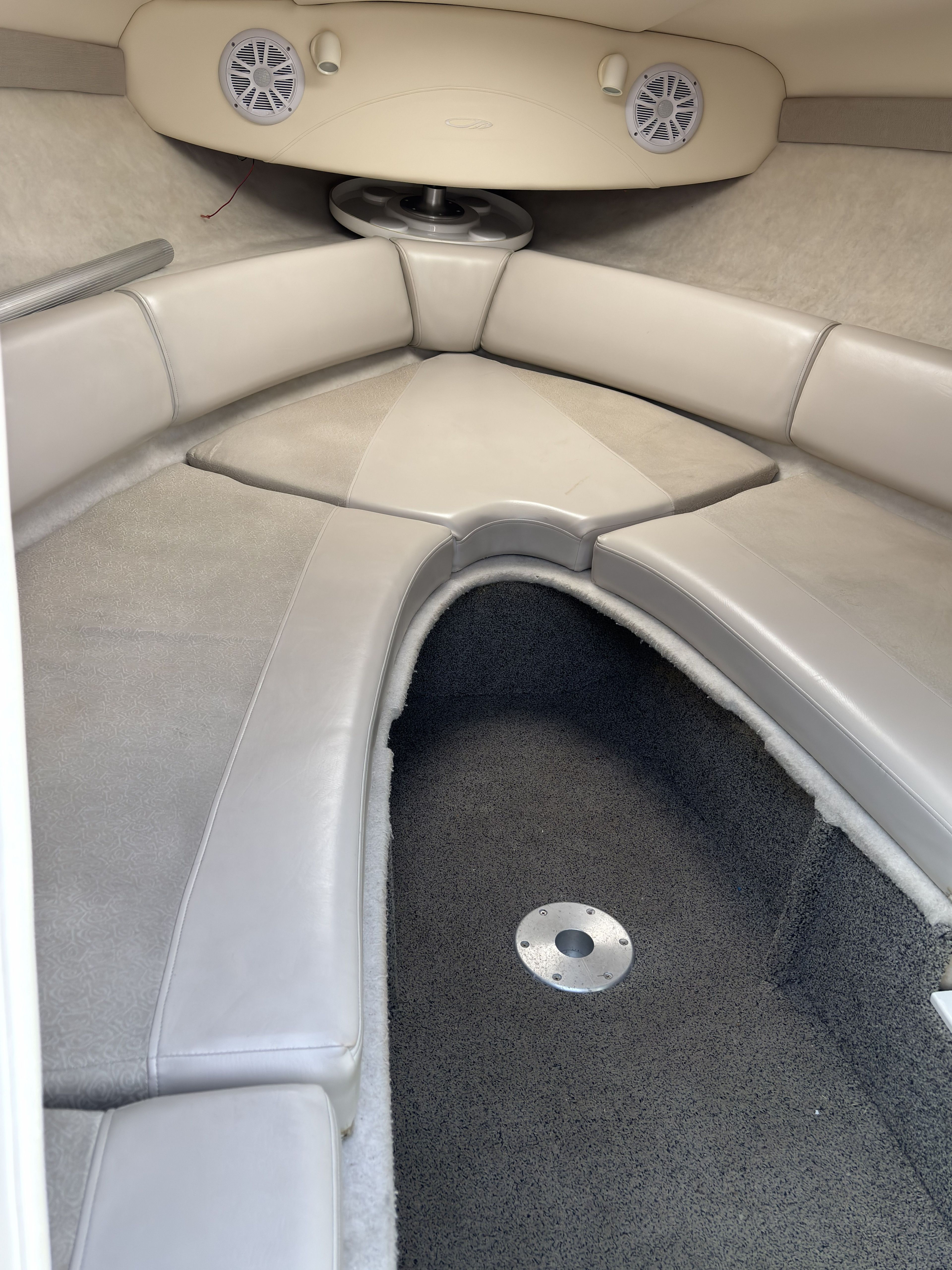 Interior of a 2005 Maxum 2400 SC3 boat with gray upholstery.