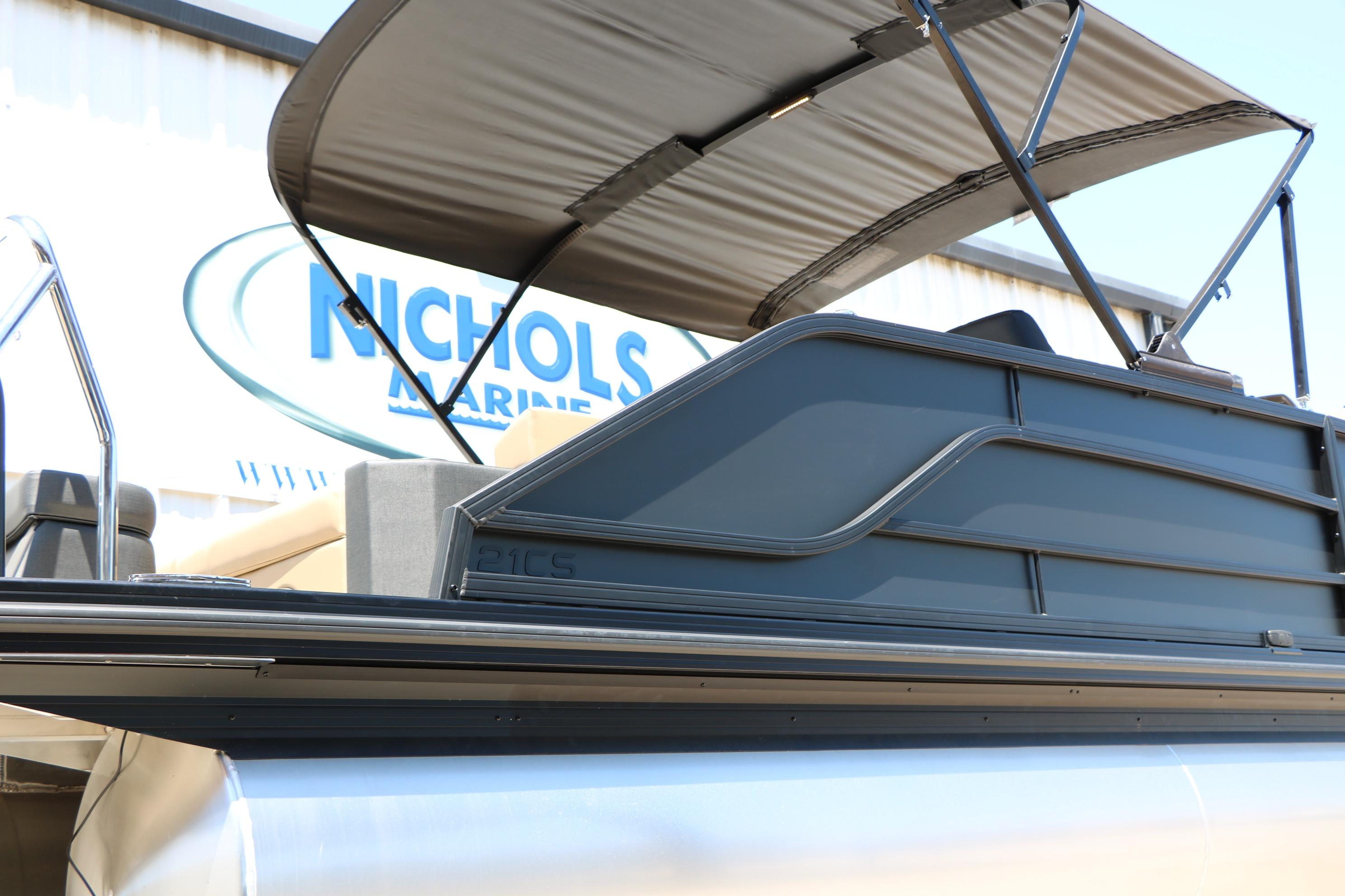 2026 Evotti 521CS boat with canopy at Nichols Marine dealership.