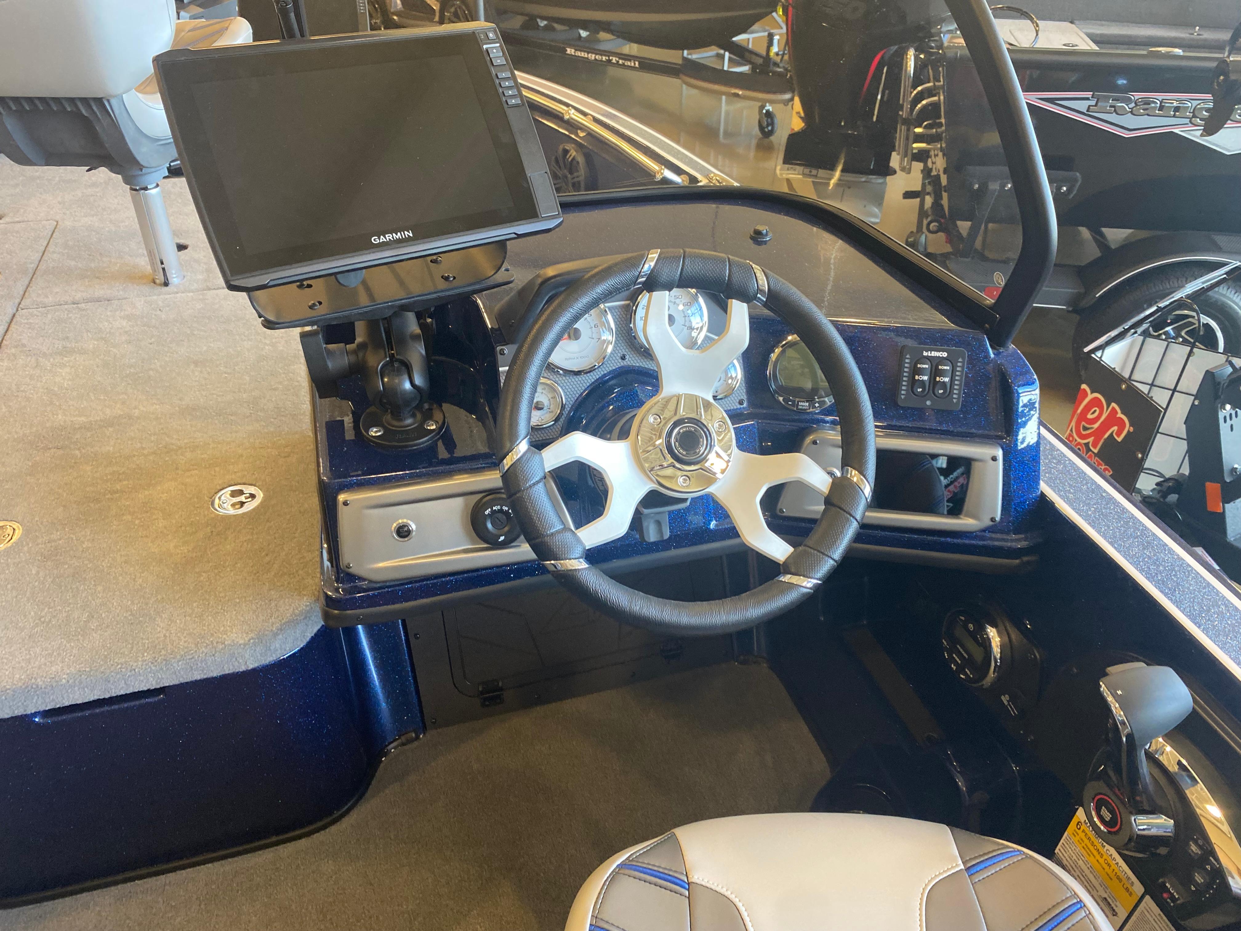 Nitro ZV20 Pro 2025 boat dashboard with steering wheel and Garmin display.