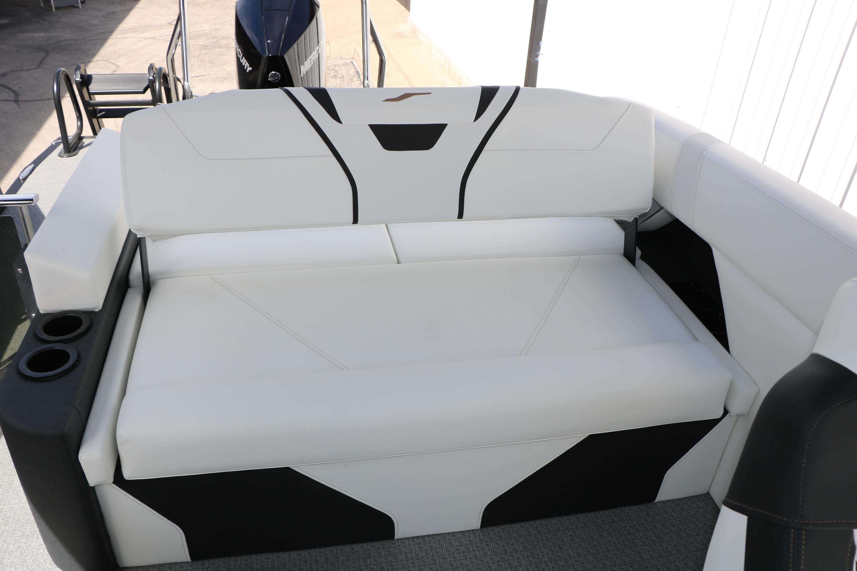 Luxurious seating on 2026 Evotti 725 CS Tri-Toon boat with modern design.