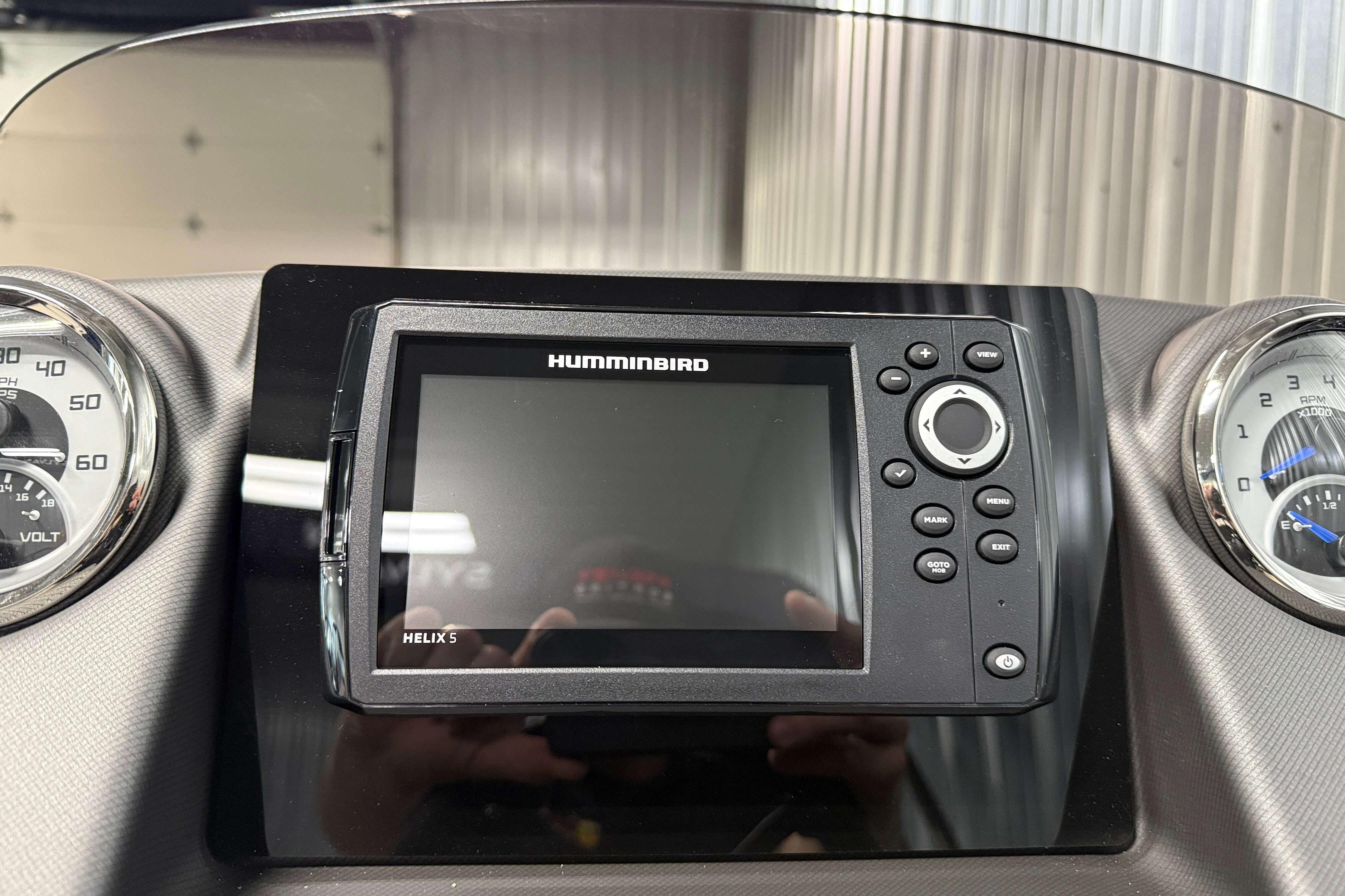 Dashboard of 2026 Sylvan L3 SLZ with Humminbird Helix 5 display.