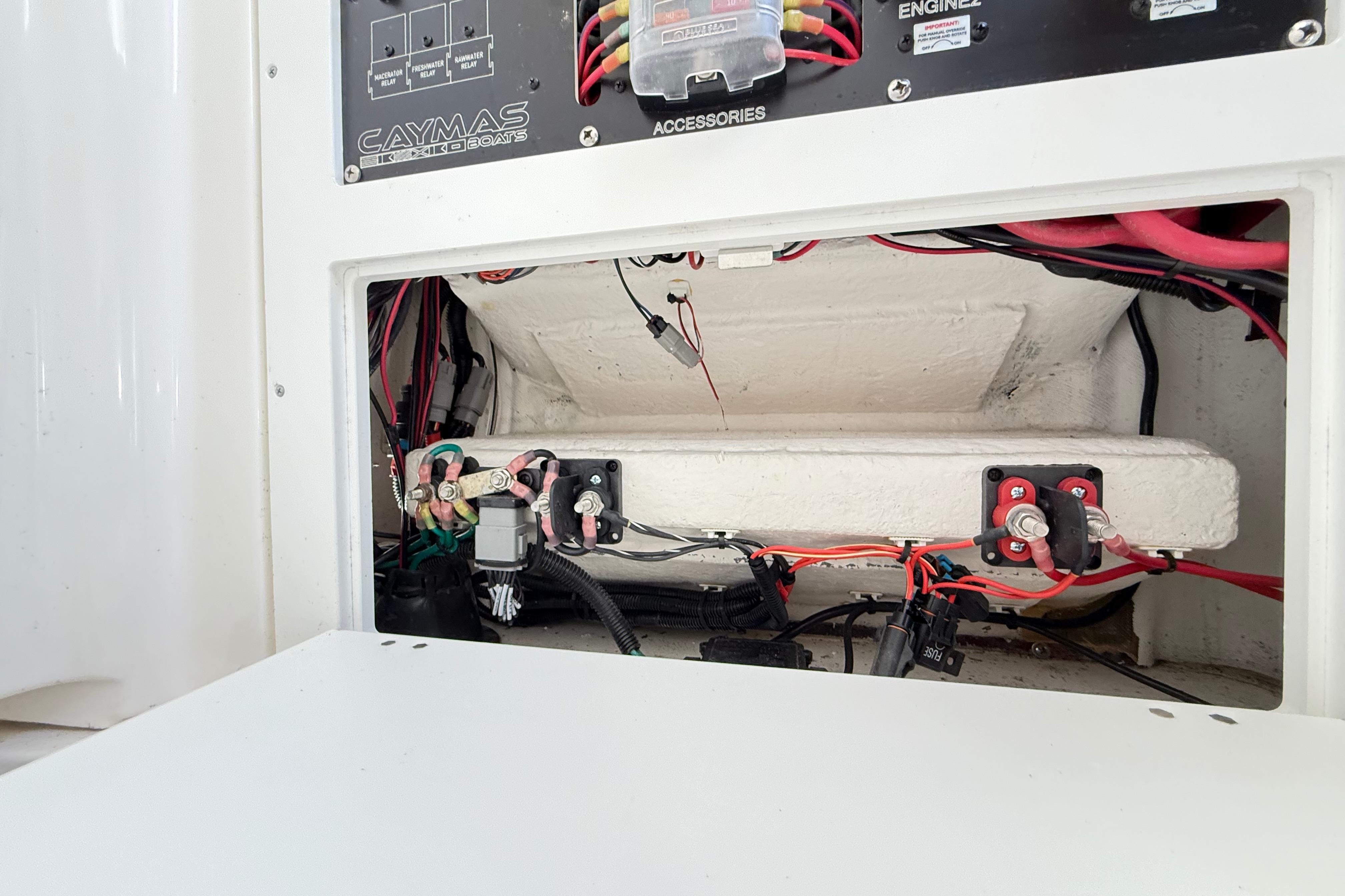 2023 Caymas 281 HB boat electrical panel with wiring and components.