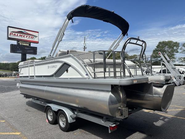 2025 Godfrey SWEETWATER 2286 SFL pontoon boat on trailer, outdoor dealership display.