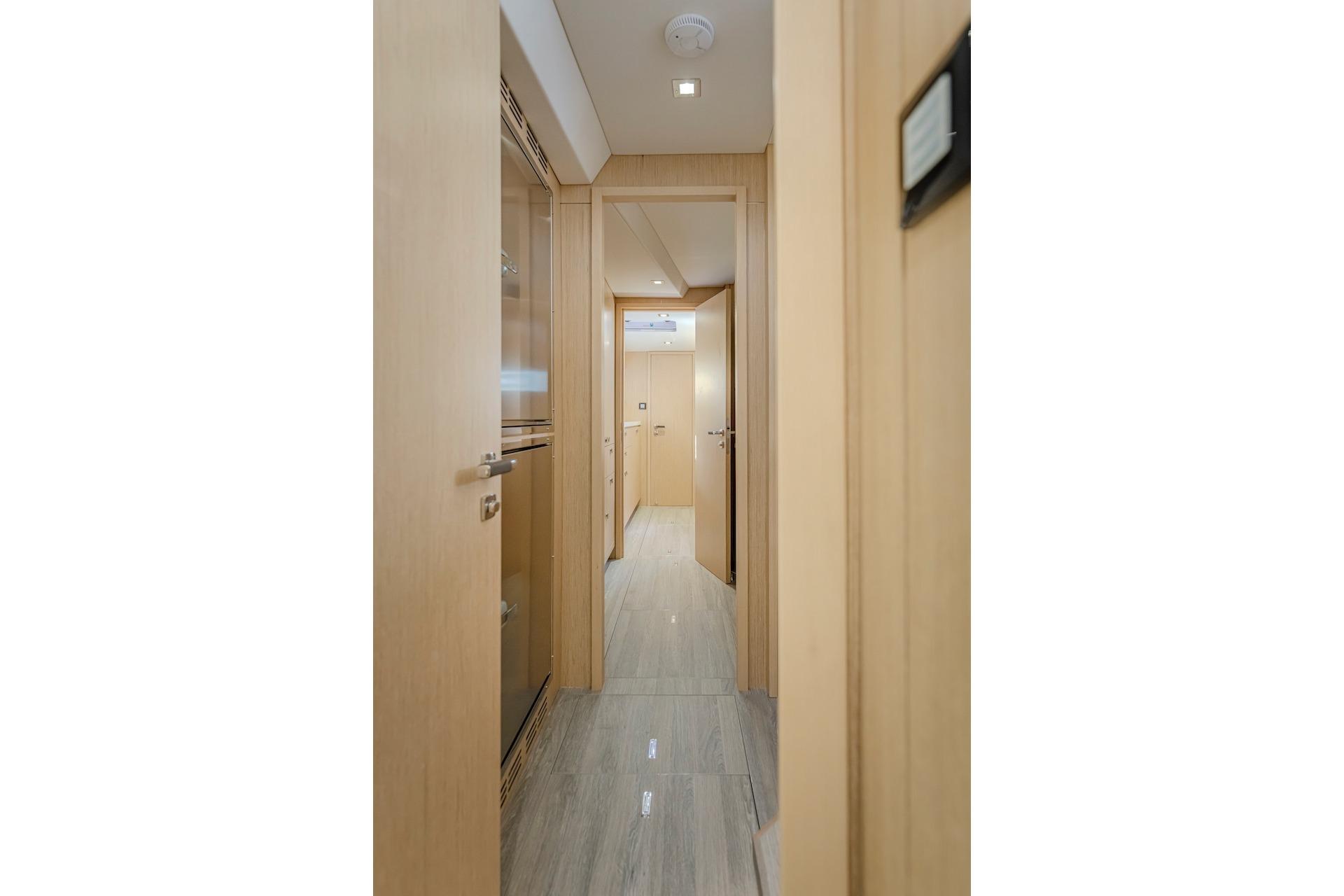 Interior of Privilege Signature 510, 2025 model, featuring modern wood design.