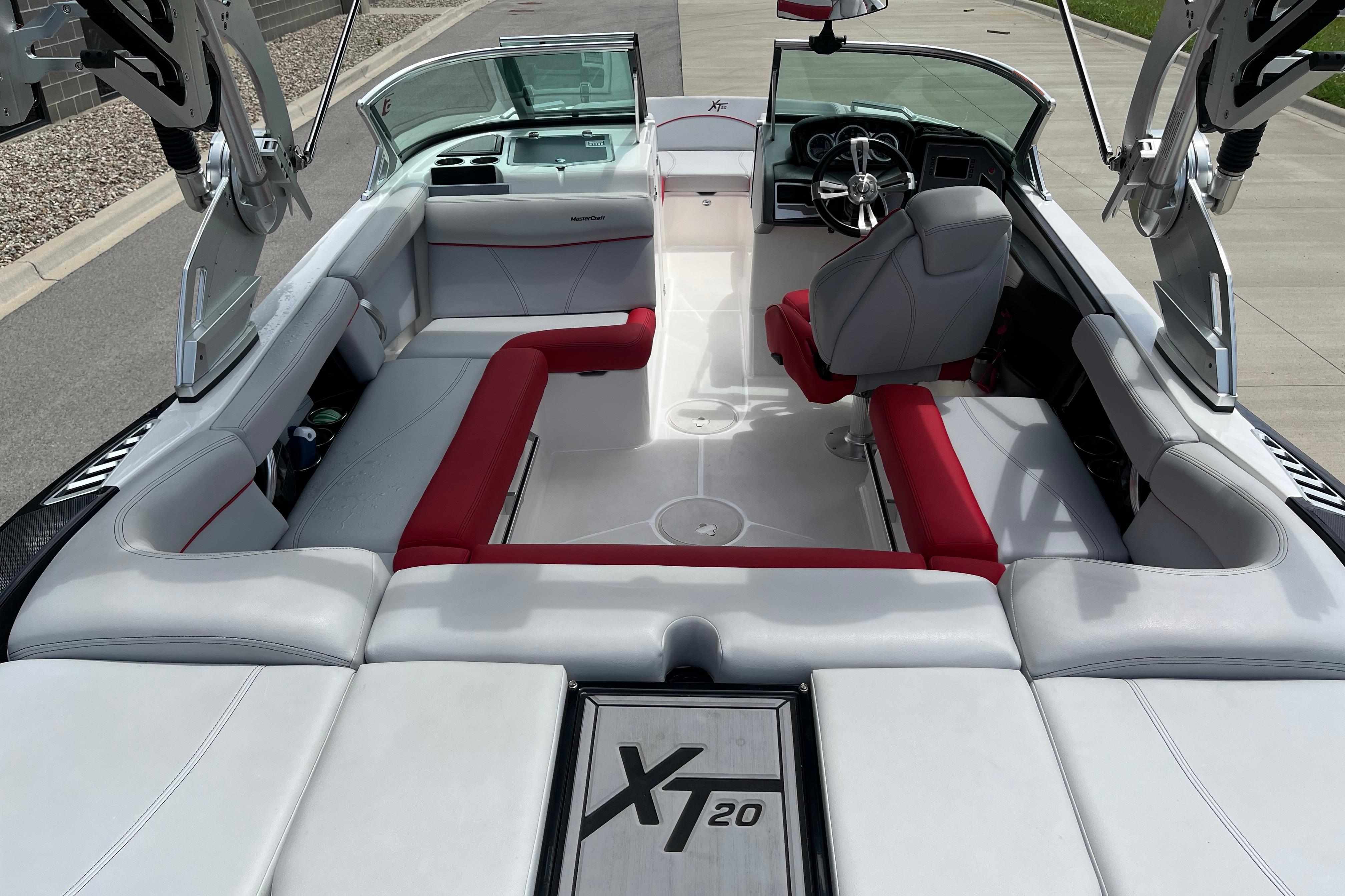 2019 MasterCraft XT20 boat interior with red and white seating, open deck layout.