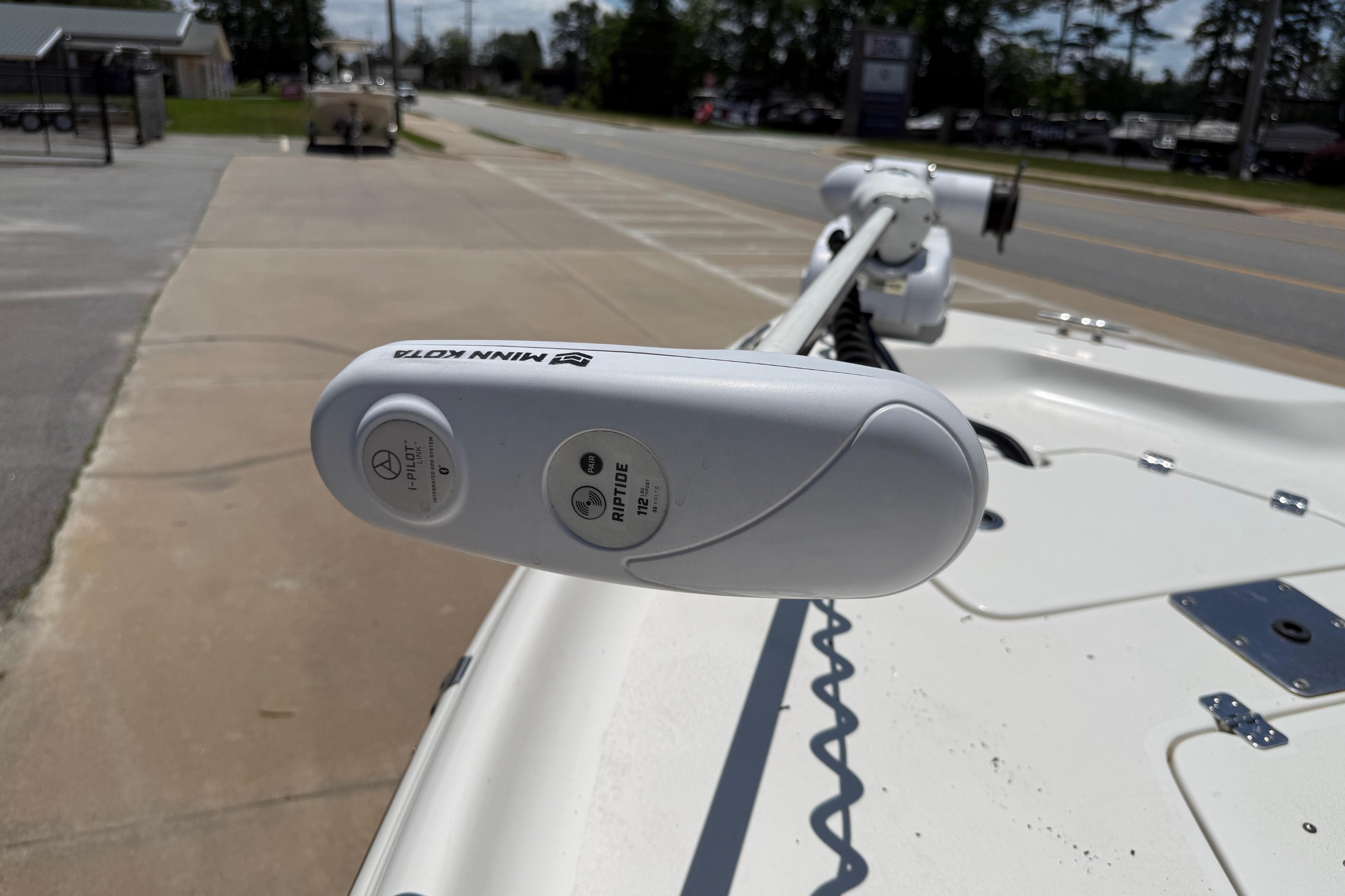 2019 Key West 230 Bay Reef boat with Minn Kota trolling motor on deck.