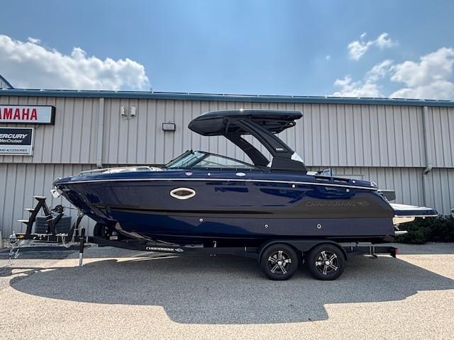 2026 Chaparral SSX 6 boat on trailer, parked outdoors under a clear sky.