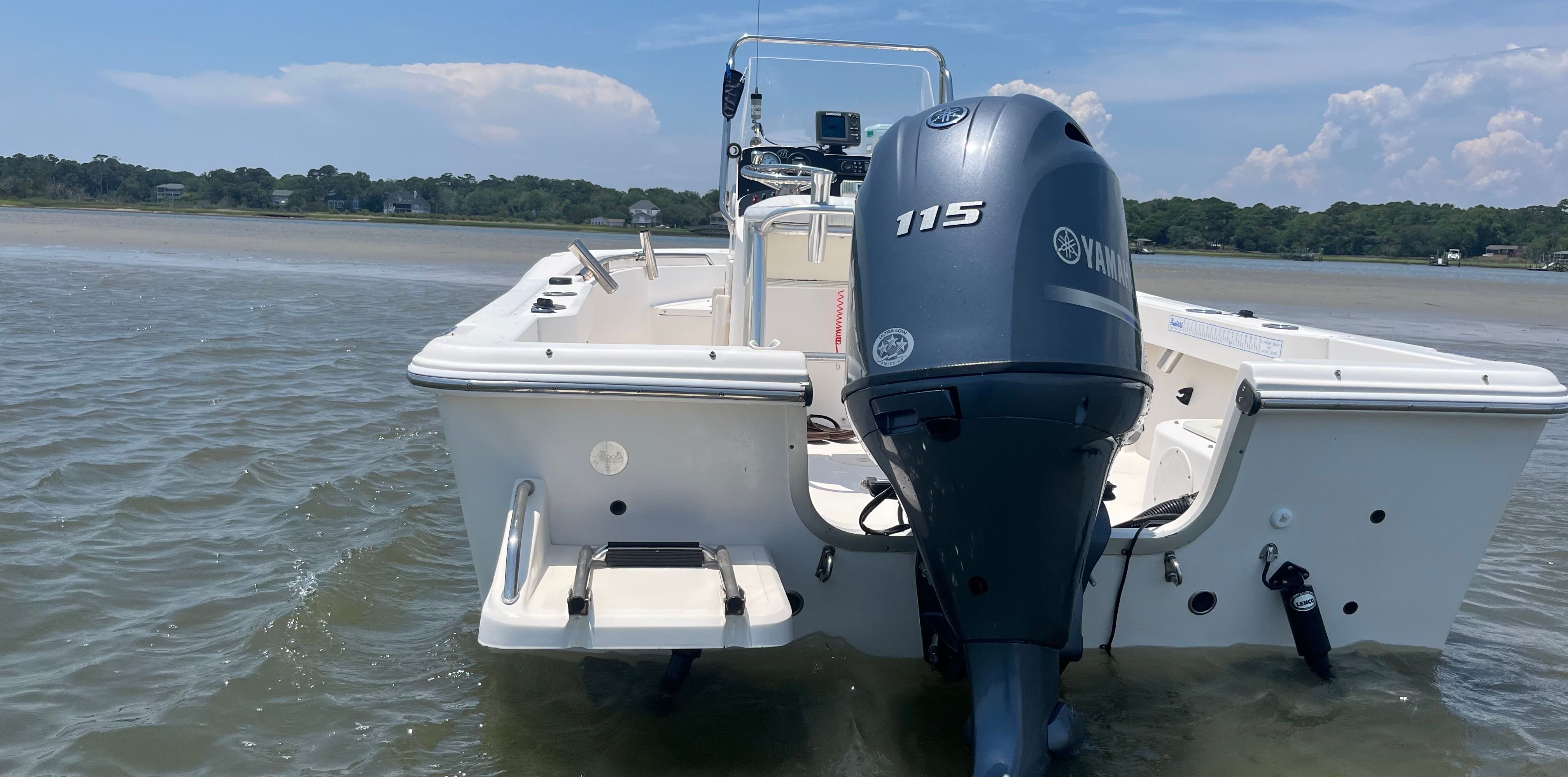 A McKee Craft Marathon 184 CC boat in shallow water with a Yamaha 115 engine.