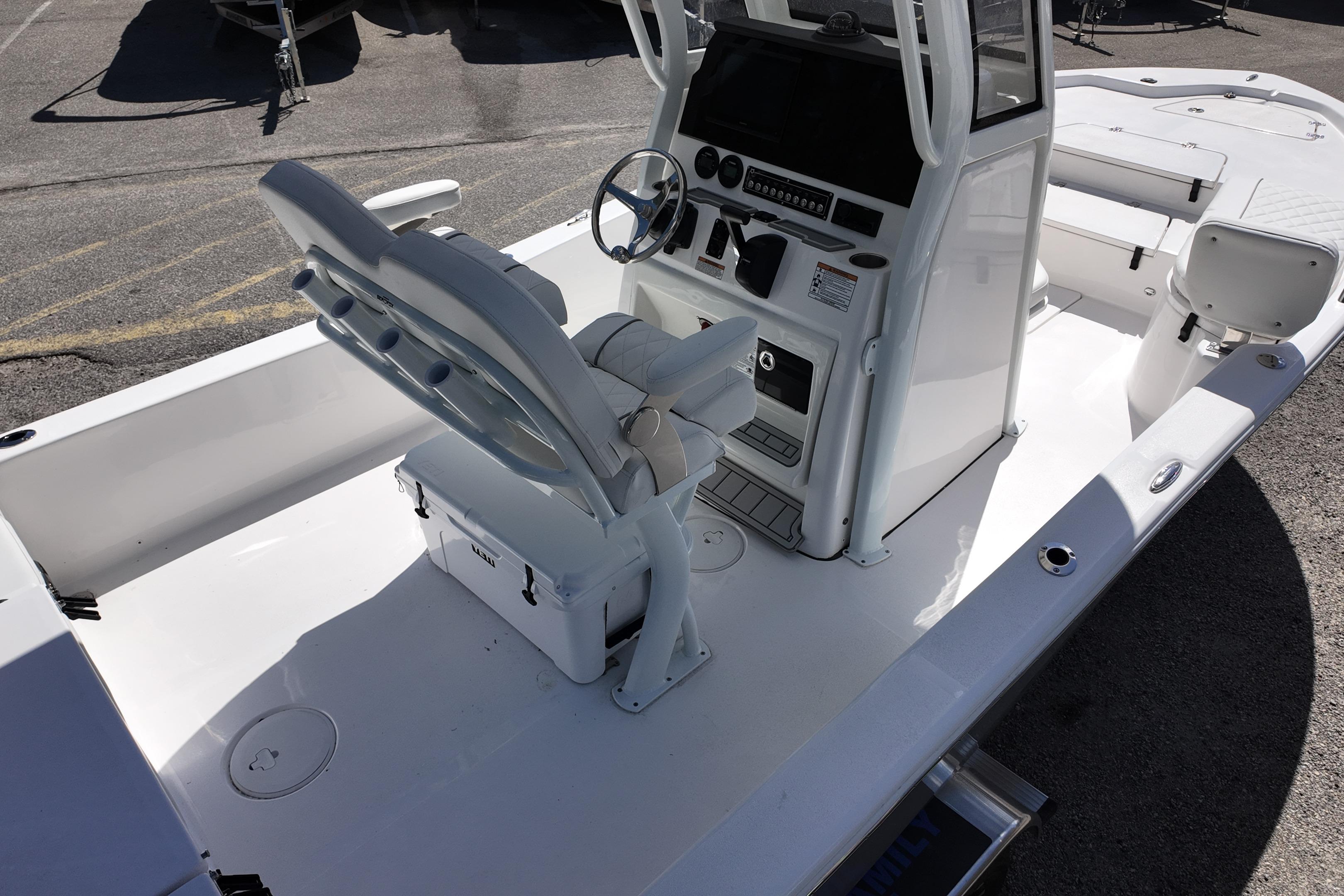 2026 Sea Fox 251 Bay Fox boat interior with helm and seating.