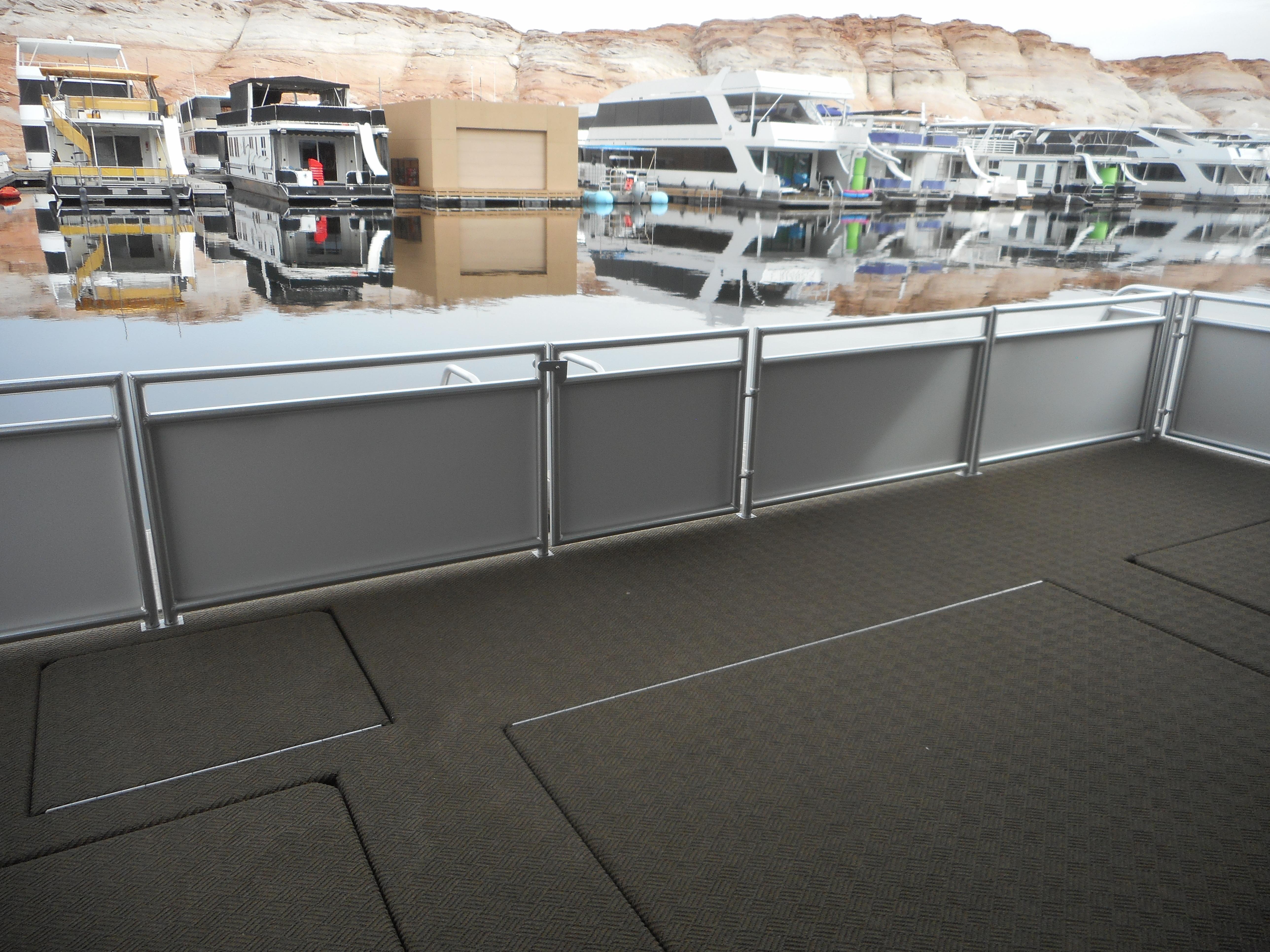 Houseboats on a lake with reflective water, Adonia Sojourn Trip #9, 2021.