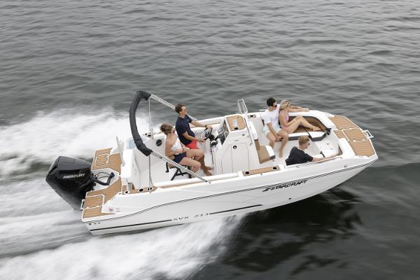 2025 Starcraft SVX 211 OB CC boat cruising with passengers on open water.