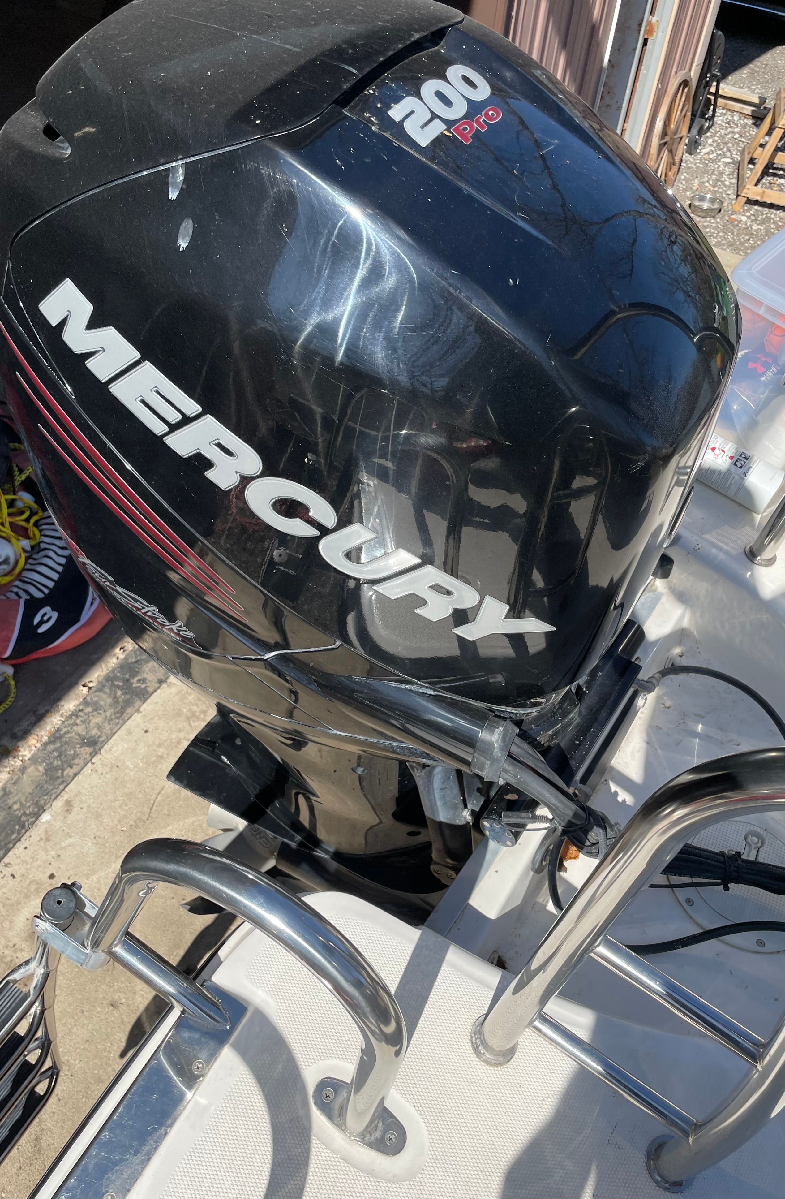 A Mercury 200 Pro outboard motor on a Bayliner Element XR7 boat.