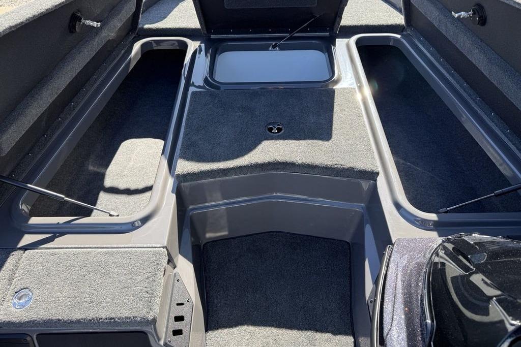 Interior view of 2026 Skeeter ZX150 boat, showcasing spacious storage compartments.